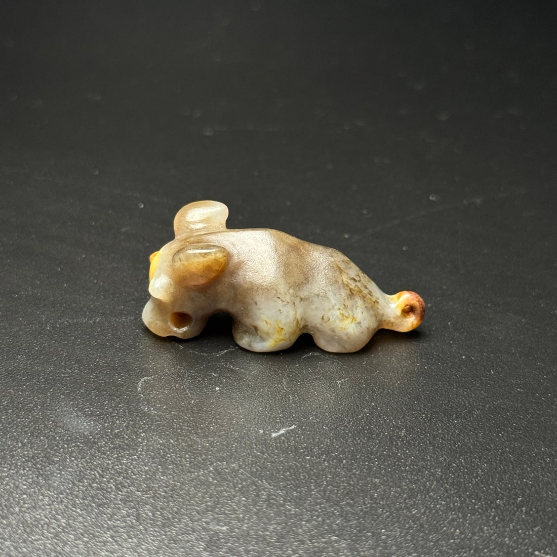 An Exquisite White Jade Auspicious Animal Pendant: An Exquisite White Jade Auspicious Animal Pendant,Han Dynasty,China,Size:1.7inx0.7inx0.7in,Weight:18g,白玉瑞兽挂件,中国汉代