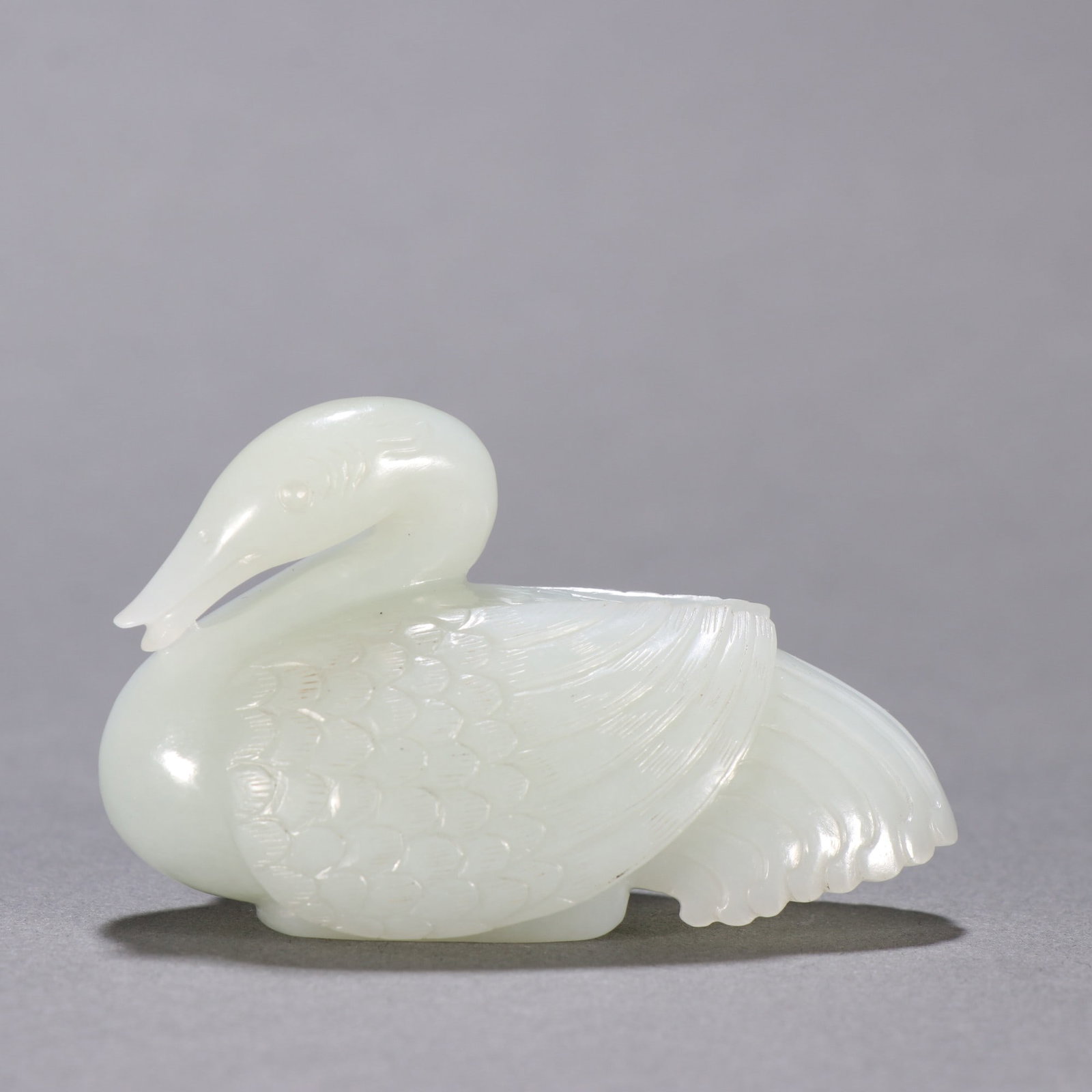 An Exquisite White Jade Goose Ornament: An Exquisite White Jade Goose Ornament,Qing Dynasty,China,Size:1.7inx2.7in,白玉鹅摆件,中国清代