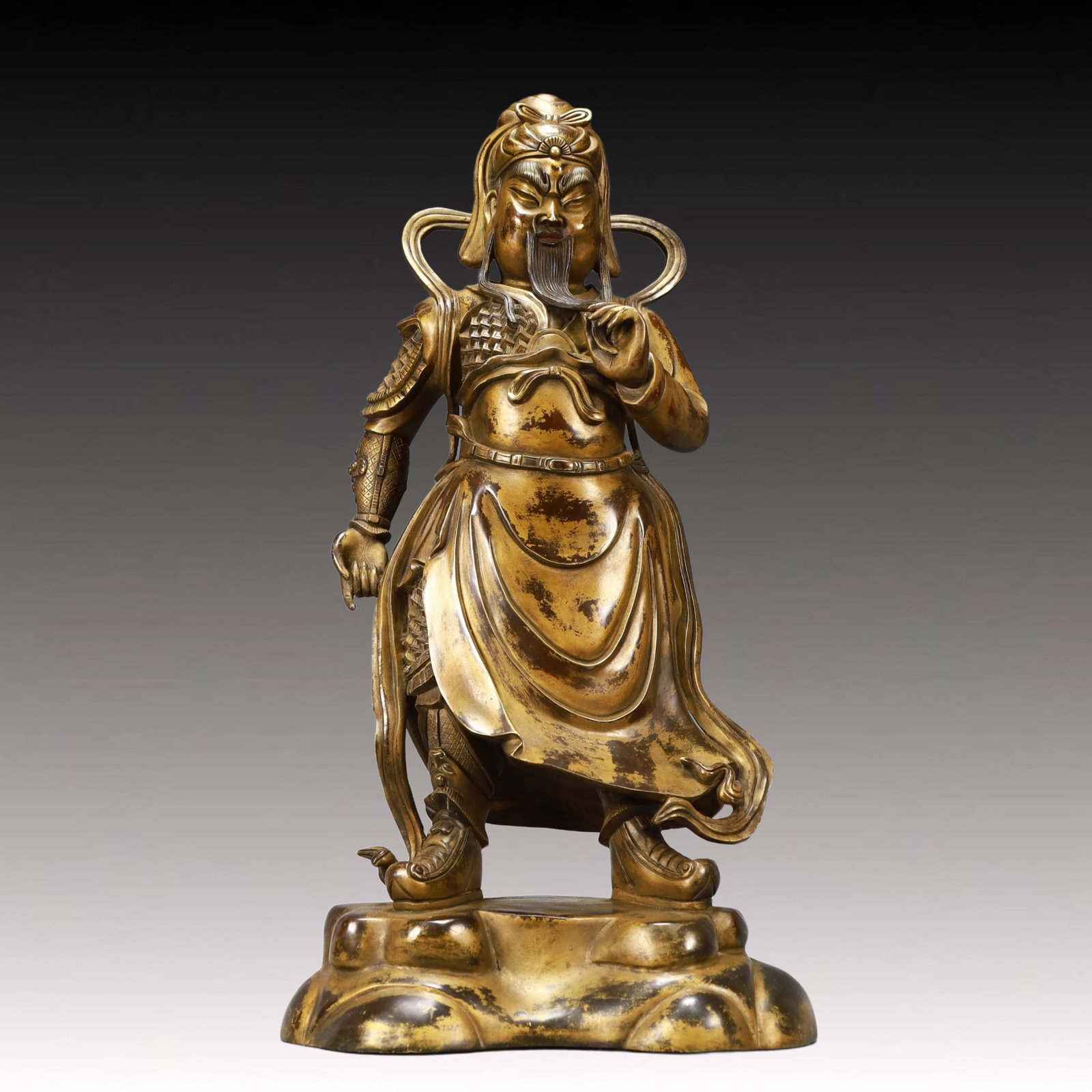 A Solemn Gilt Bronze Statue of ??Guan Gong??: A Solemn Gilt Bronze Statue of ‘Guan Gong’,Ming Dynasty,China,Size:12.2inx5.3inx22in,Weight:16700g,铜鎏金关公像,中国明代