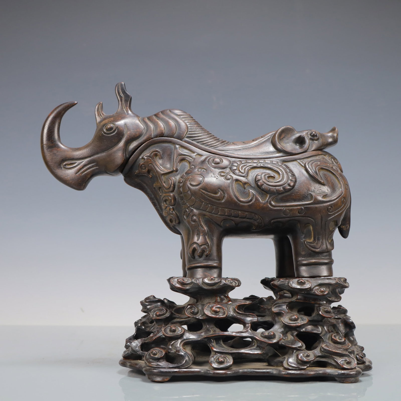 An Exquisite Eaglewood Rhinoceros Ornament: An Exquisite Eaglewood Rhinoceros Ornament,Qing Dynasty,China,Size:11inx5.1inx15in,Weight:900g,沉香木犀牛摆件,中国清代