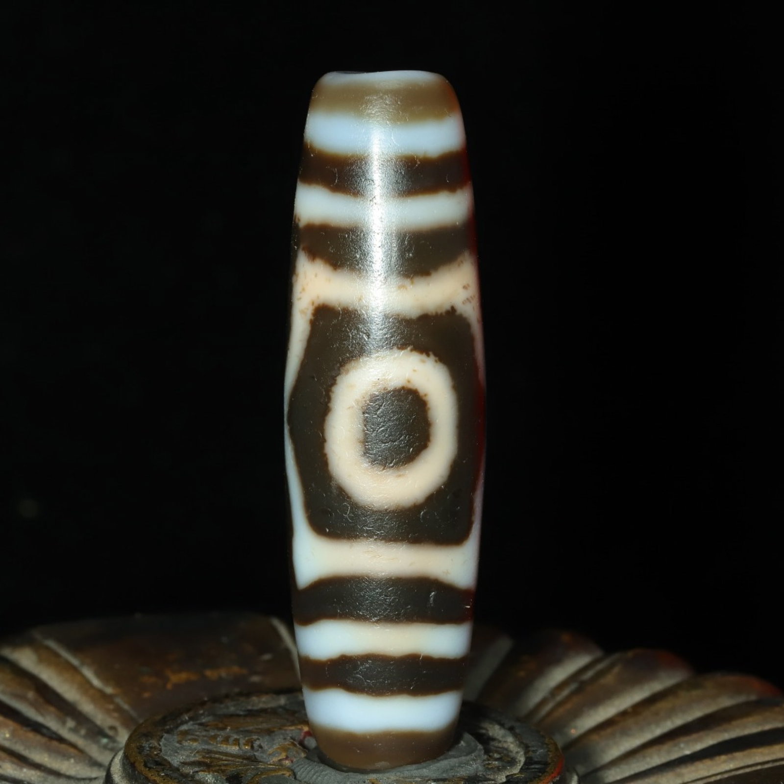 An Exquisite Three Eyes Dzi Bead Pendant: An Exquisite Three Eyes Dzi Bead Pendant,Size:48mmx14mm,Weight:15g 三眼天珠挂件