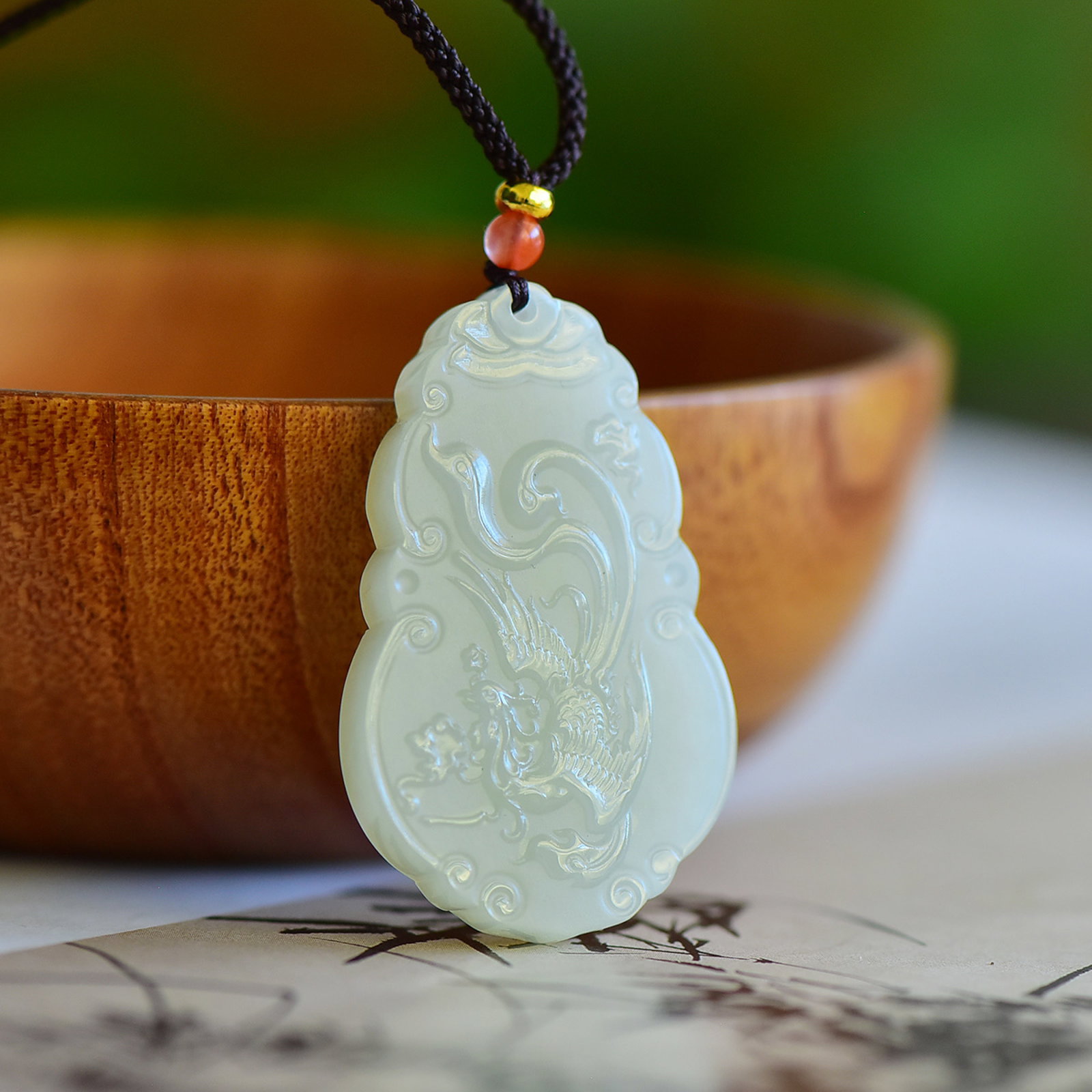 An Exquisite White Jade Phoenix Pattern Pendant (1 of 5)
