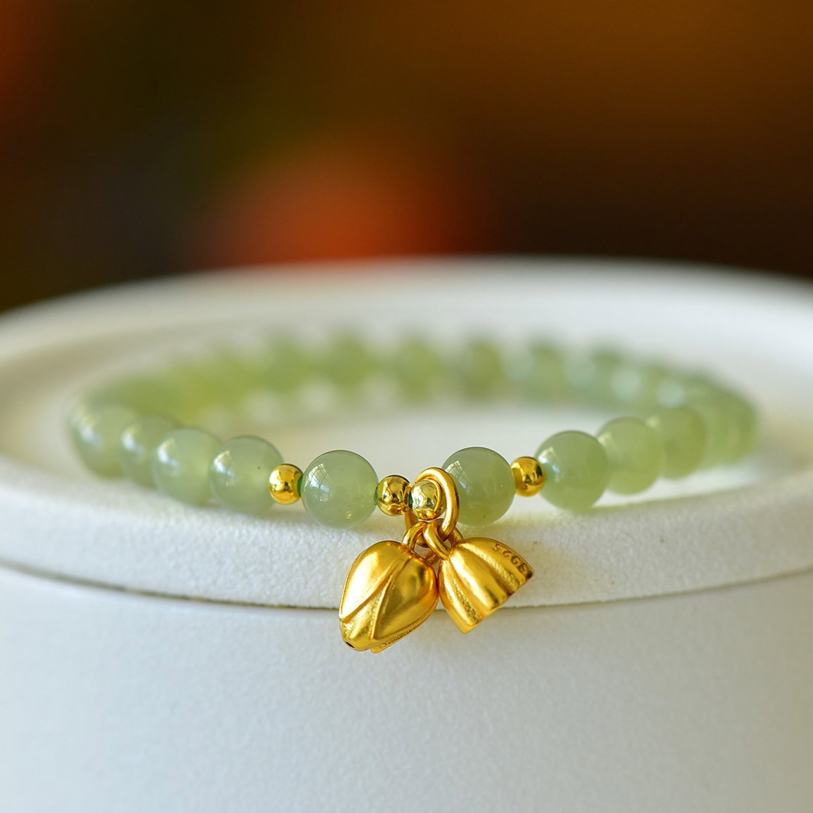 An Exquisite Sterling Silver-Gold Plated Inlaid White Jade Bracelet: An Exquisite Sterling Silver-Gold Plated Inlaid White Jade Bracelet,Size:6mm 纯银镀金镶白玉手链