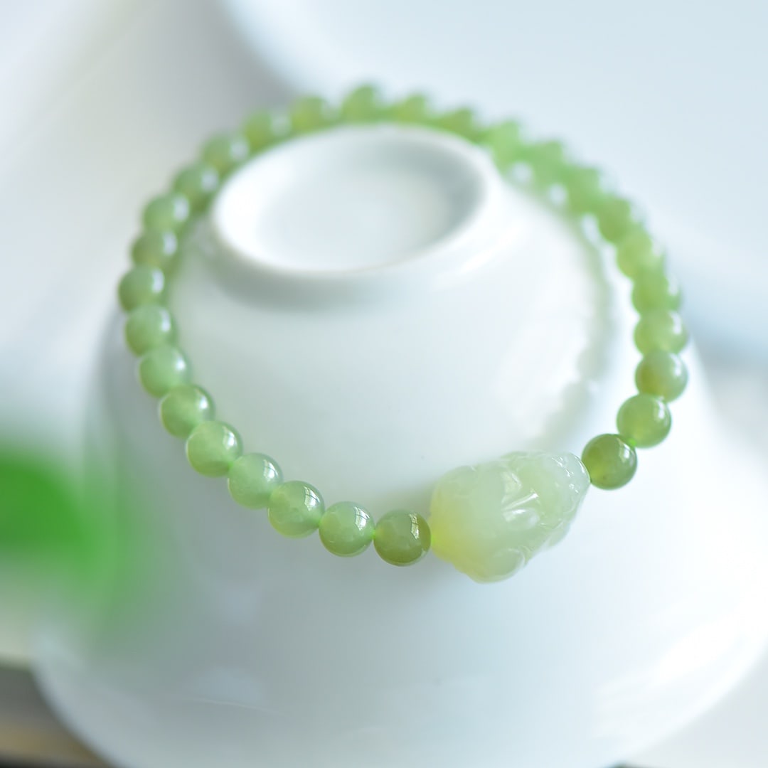 An Exquisite Greenish Jade Bracelets: An Exquisite Greenish Jade Bracelets,Size:6mm 青白玉手串
