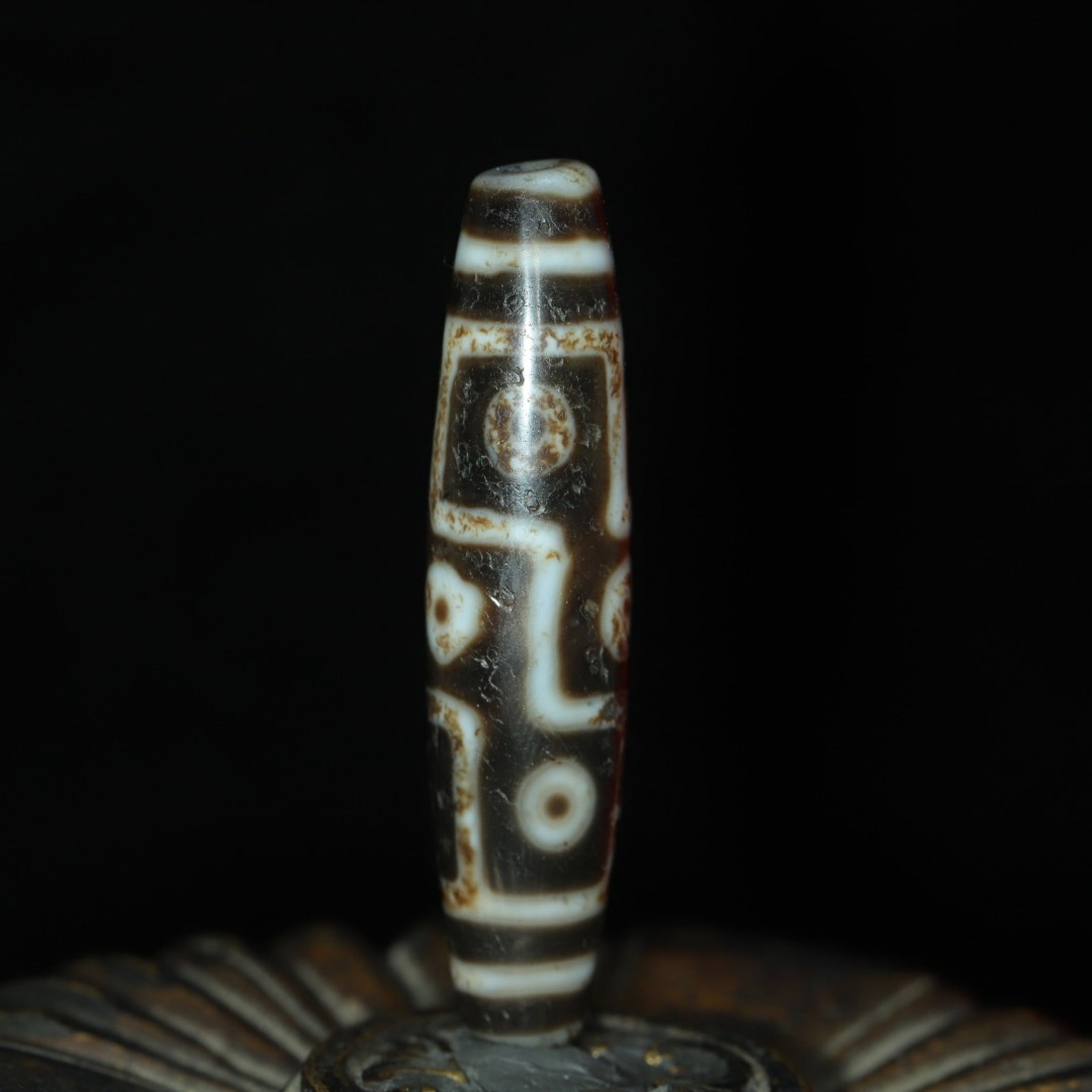 An Exquisite Nine Eyes Dzi Bead Pendant: An Exquisite Nine Eyes Dzi Bead Pendant,Size:55mmx13mm,Weight:13g 九眼天珠挂件