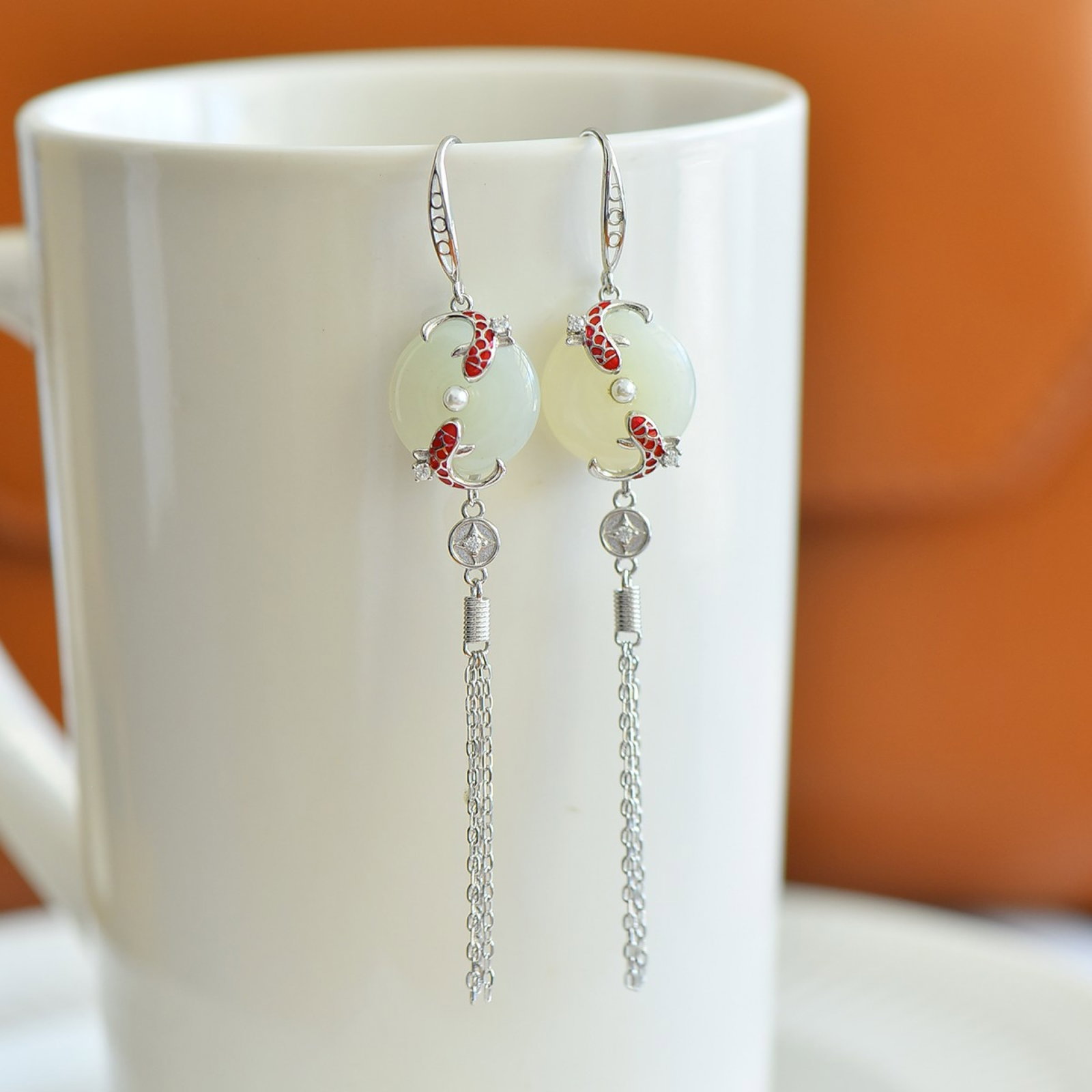 A Pair of Exquisite Sterling Silver Inlaid White Jade Earrings: A Pair of Exquisite Sterling Silver Inlaid White Jade Earrings,Size:15mmx15mm 一对精美的纯银镶白玉耳环