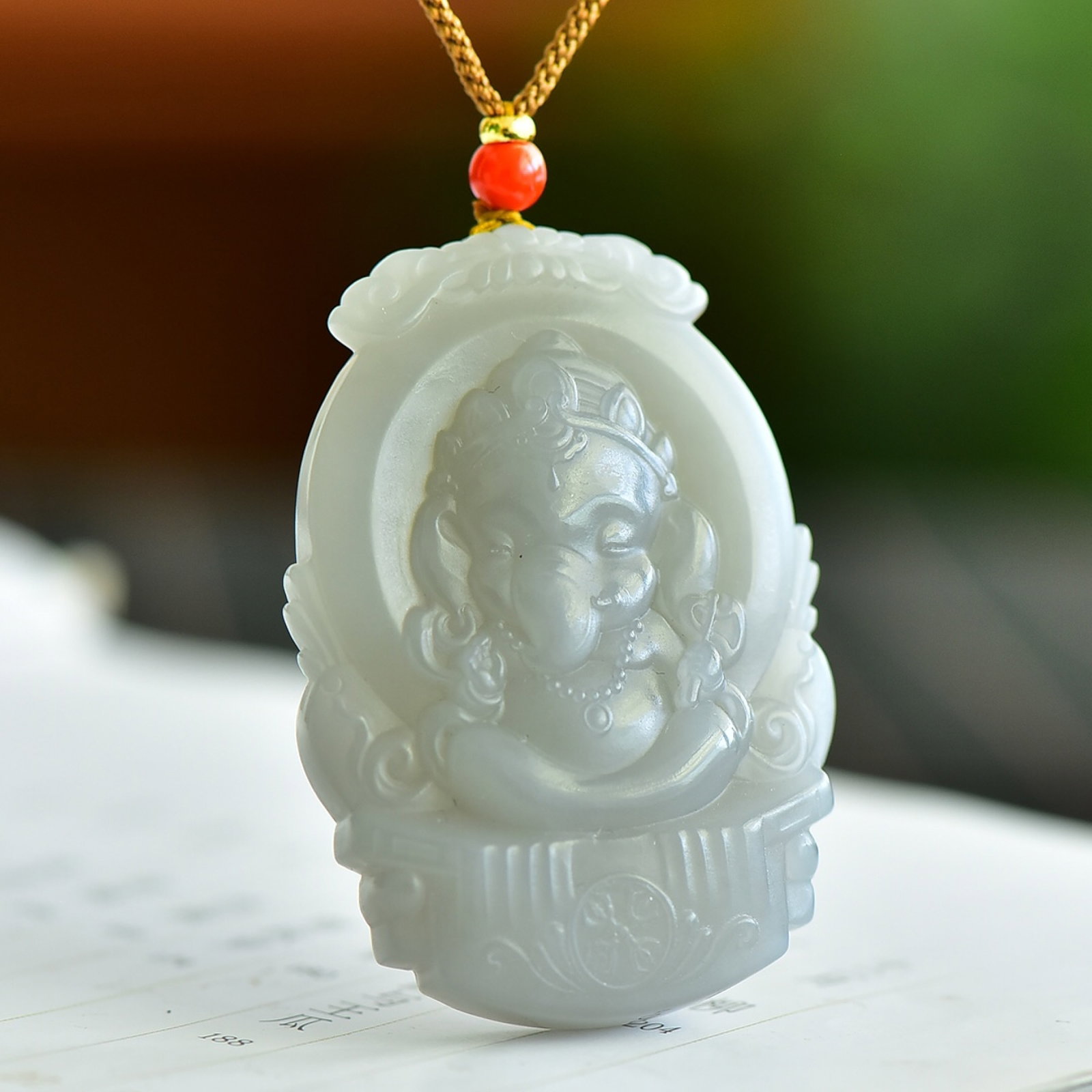 An Exquisite White Jade Buddha Pattern Pendant: An Exquisite White Jade Buddha Pattern Pendant,Size:56mmx39mm 白玉佛像纹吊坠