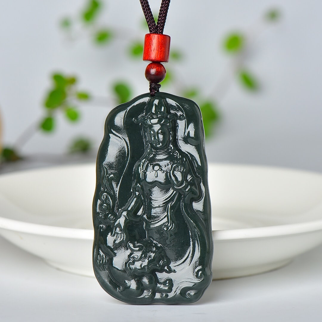 An Exquisite Sapphire Avalokitesvara Pattern Pendant: An Exquisite Sapphire Avalokitesvara Pattern Pendant,Size:38mmx65mm 寓意:寓意吉祥 玉脂温润