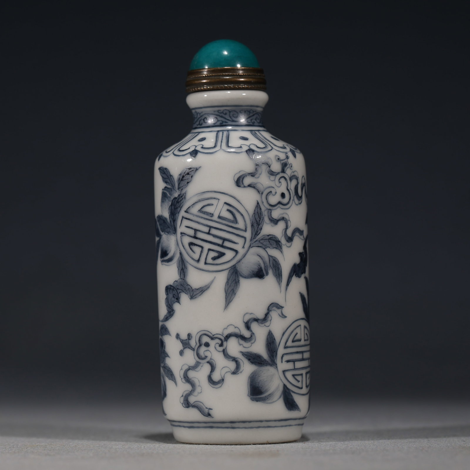 An Exquisite Blue And White Snuff Bottle With Fortune,Longevity And Peach Pattern: An Exquisite Blue And White Snuff Bottle With Fortune,Longevity And Peach Pattern,China,Qing Dynasty,Four-Character Qianlong Mark,Dimensions:3.3inx1.2in,青花福寿桃纹