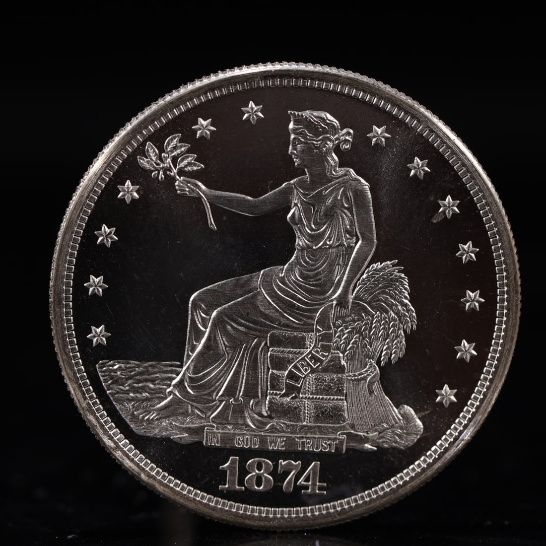 USA Trade Dollar 1874 Coin: American coin. Obverse: Liberty seated on a pedestal facing the sea to the left holding olive branches surrounded by 13 stars. IN GOD WE TRUST / LIBERTY / 1874. Reverse: An eagle holding branches