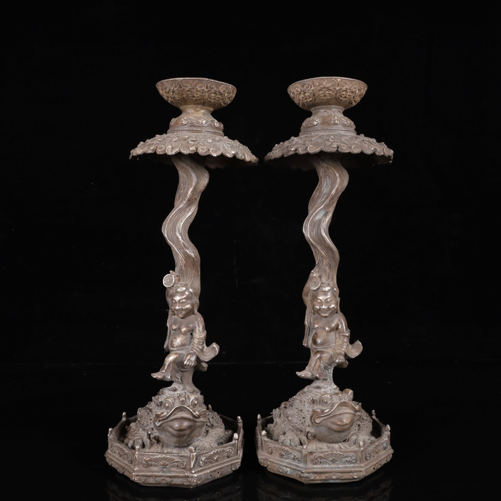A Pair of Exquisite Silver-Plated Bronze Figure Pattern Auspicious Beast Candlesticks: A Pair of Exquisite Silver-Plated Bronze Figure Pattern Auspicious Beast Candlesticks,Qing Dynasty,China,Qianlong Four-Character Mark,Size:4.3inx13.4in,Weight:3400g
