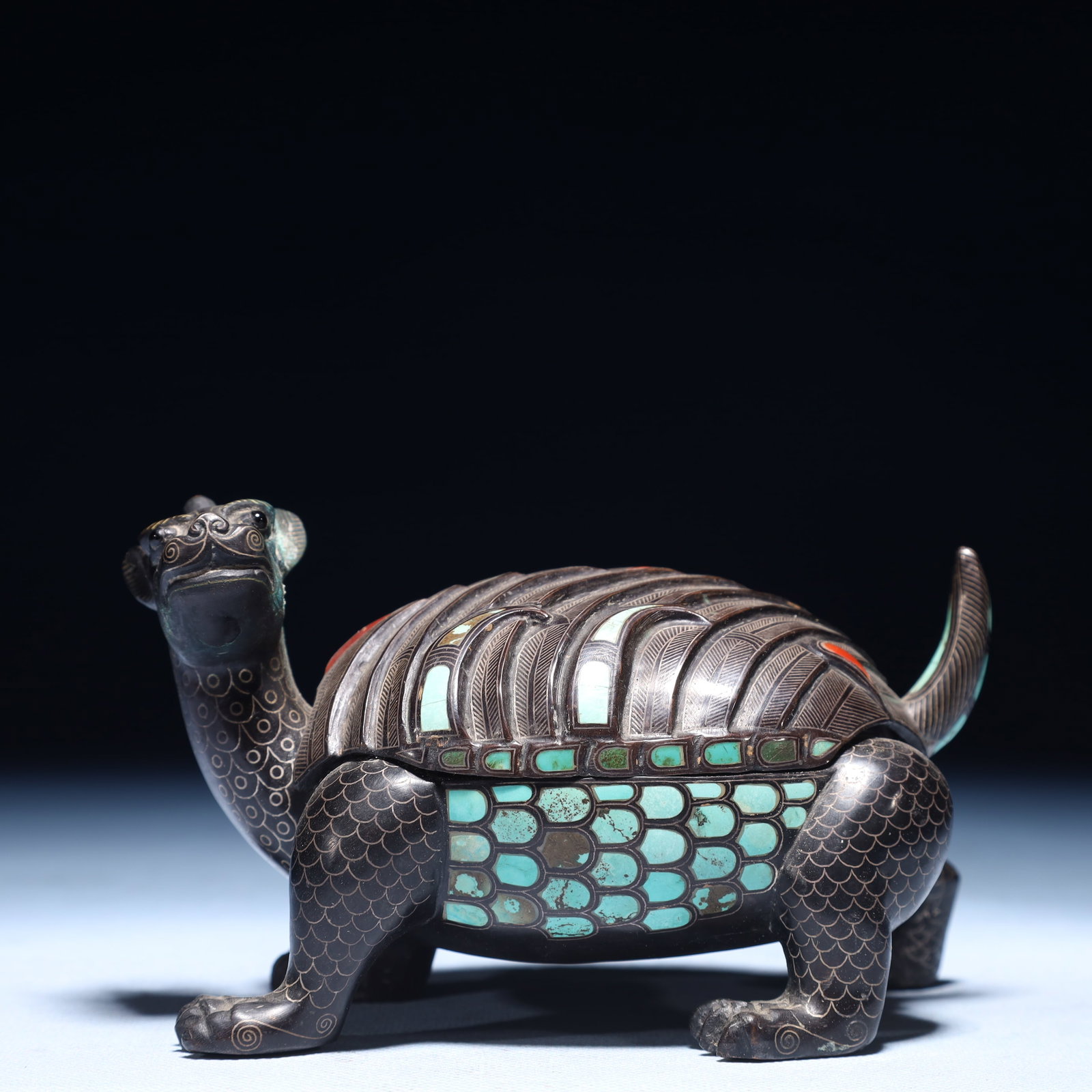 An Exquisite Inlaid Gold and Silver Auspicious Beast Ornament,Inlaid Turquoise: An Exquisite Inlaid Gold and Silver Auspicious Beast Ornament,Inlaid Turquoise,Qing Dynasty,China,Size:5.5inx3.1inx3.5in,Weight:800g 错金银瑞兽摆件,嵌&#