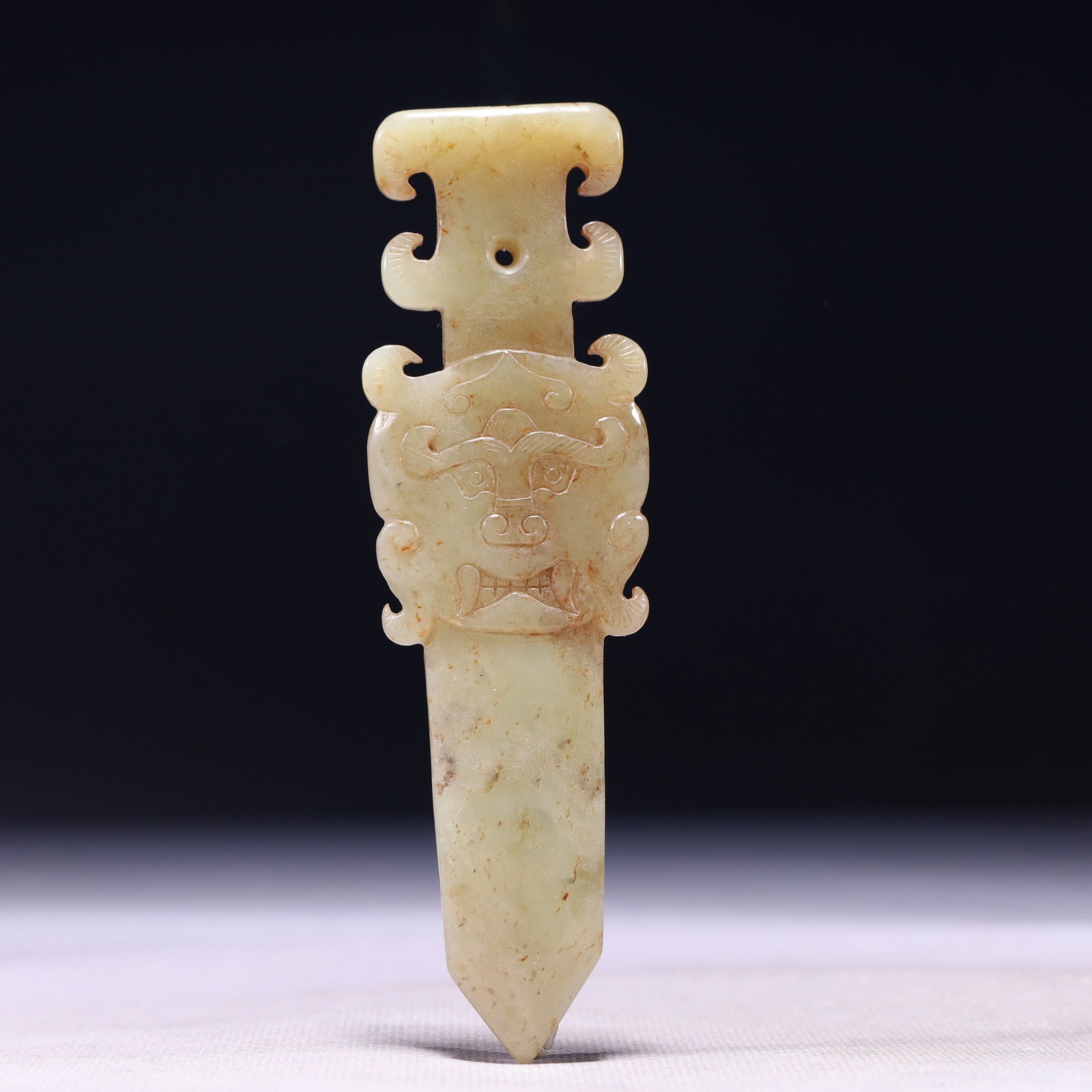 An Exquisite White Jade Beast-Face Pattern Sword