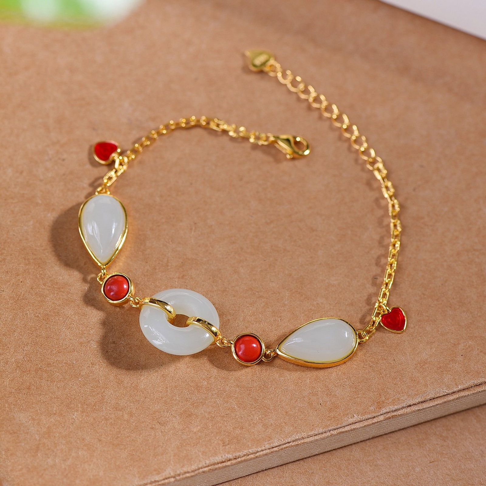 An Exquisite Sterling Silver-Gold Plated Inlaid White Jade Bracelets