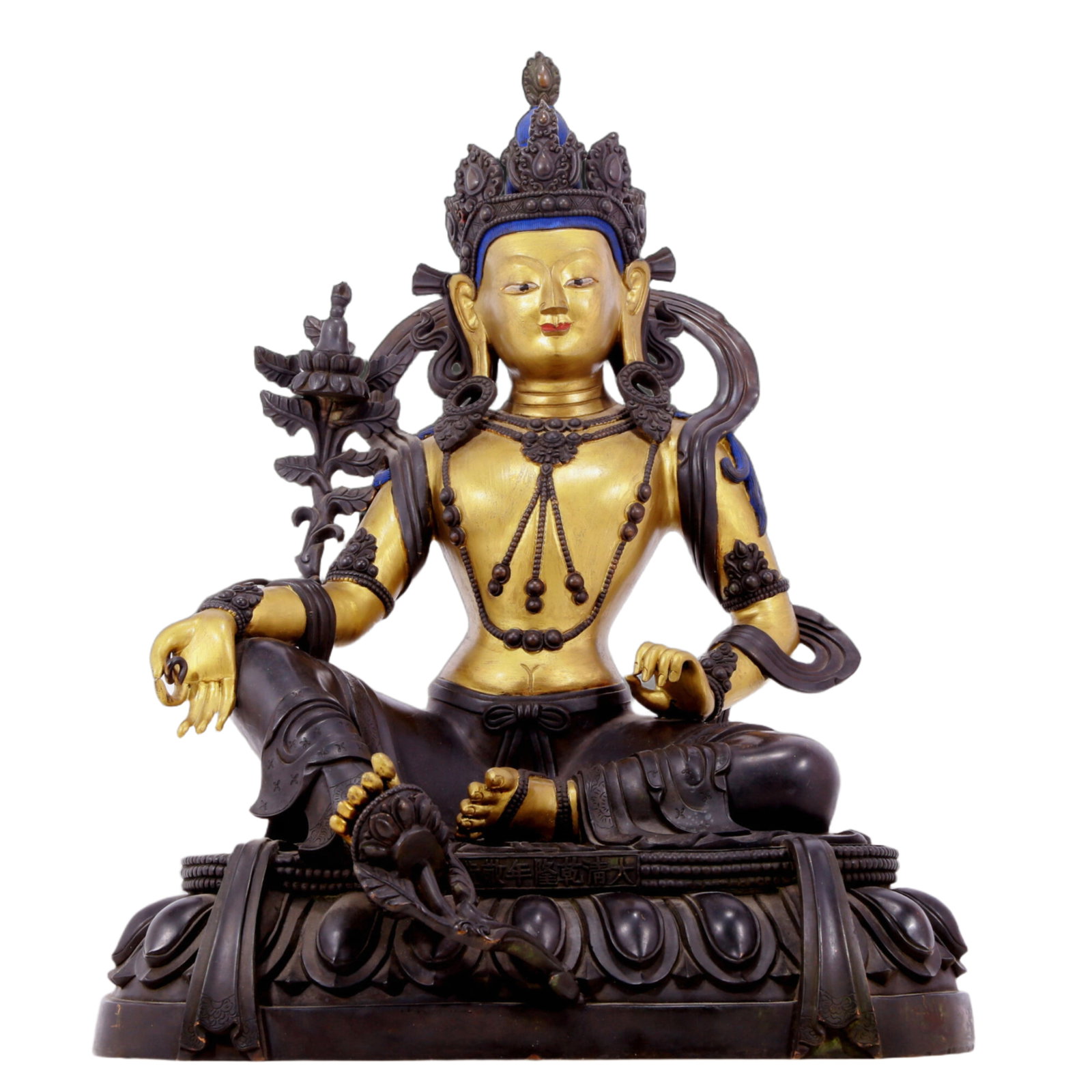 A solemn gilt bronze statue of green Tara