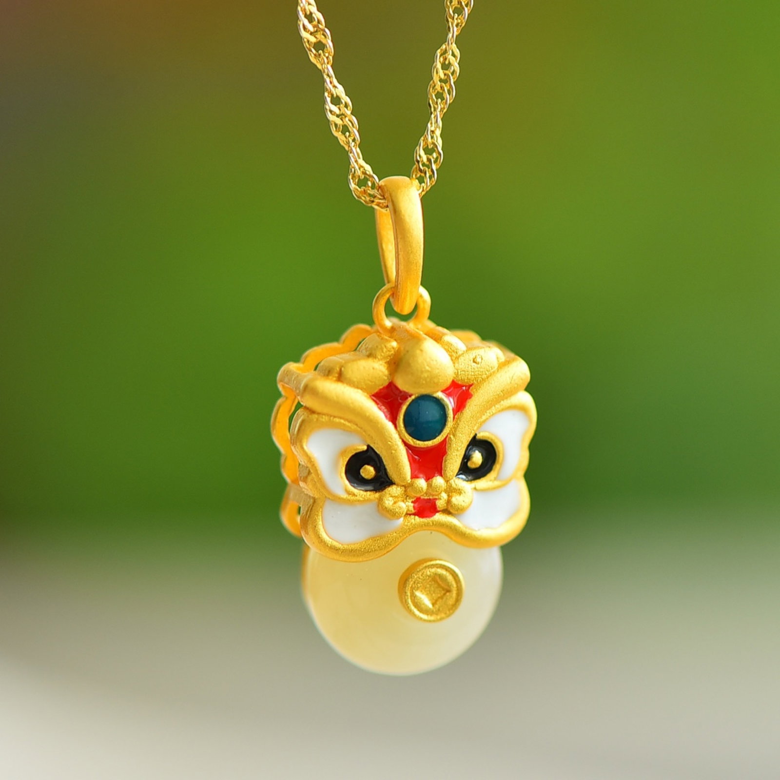 An Exquisite Sterling Silver-Gold Plated Inlaid White Jade Pendant