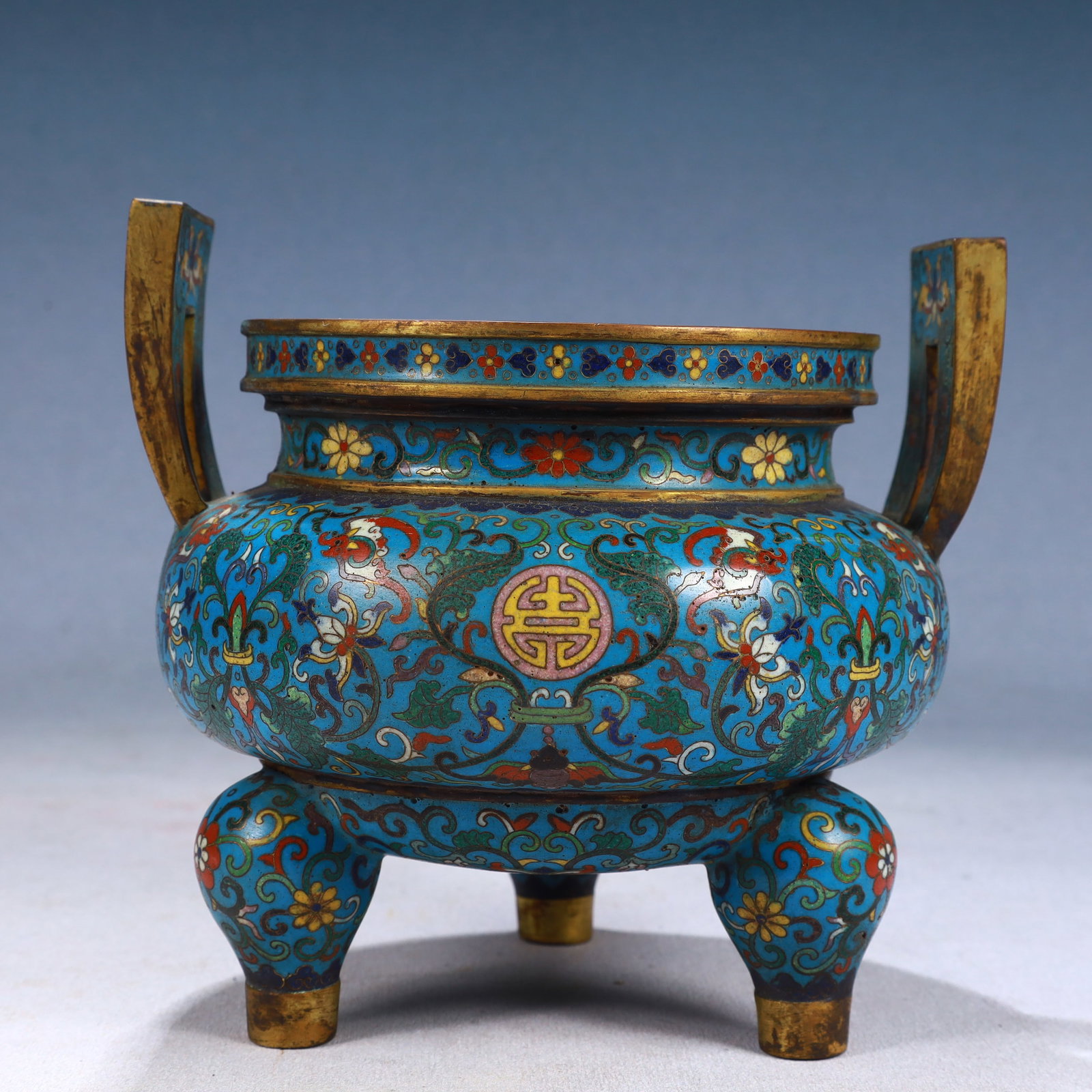 An Exquisite Cloisonne Lotus Pattern Lion-Ears and Tripod Jar: An Exquisite Cloisonne Lotus Pattern Lion-Ears and Tripod Jar,Qing Dynasty, China,Qianlong Four-character Mark,Size:6.3inx6.1in,Weight:1600g