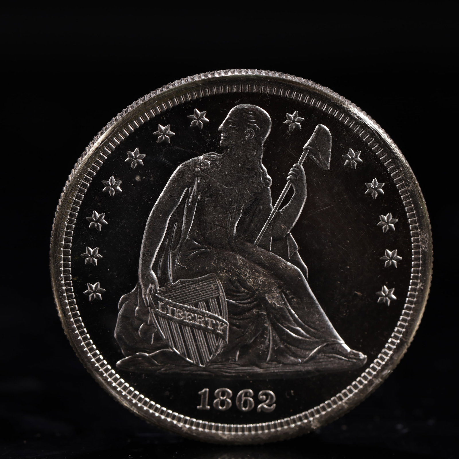 USA One Dollar 1862 Coin: American coin. IN GOD WE TRUST / LIBERTY / 1862 / UNITED STATES OF AMERICA / ONE DOL. Weight:26.9g.