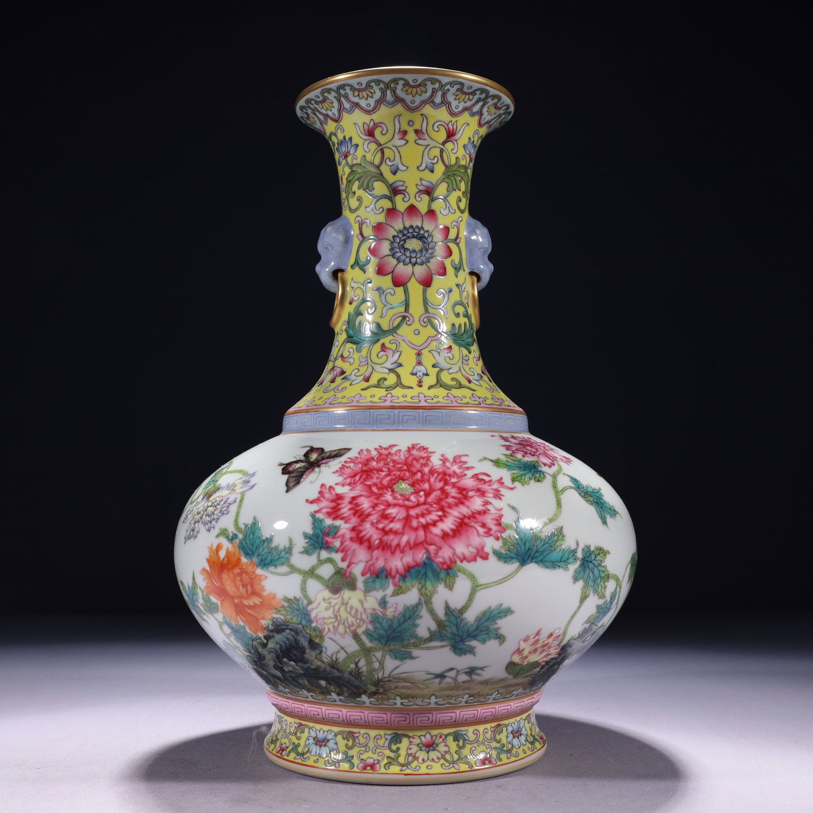 An Exquisite Yellow Ground Famille-Rose Painted Gold Flower and Butterfly Pattern Vase,with poem: An Exquisite Yellow Ground Famille-Rose Painted Gold Flower and Butterfly Pattern Vase,with poem,Qing Dynasty,China,Qianlong Six-character Mark,Size:7.5inx11.4in,Weight:1900g