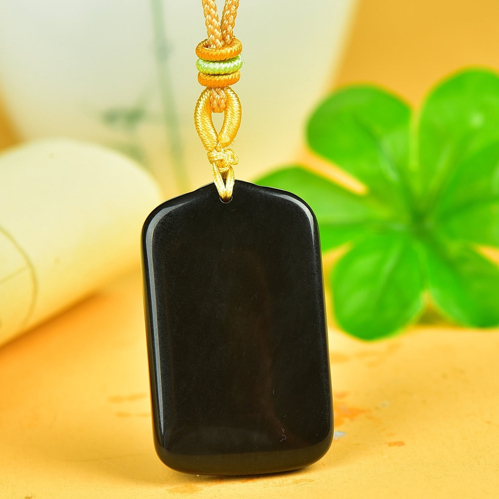 An Exquisite Black and White Jade Pendant
