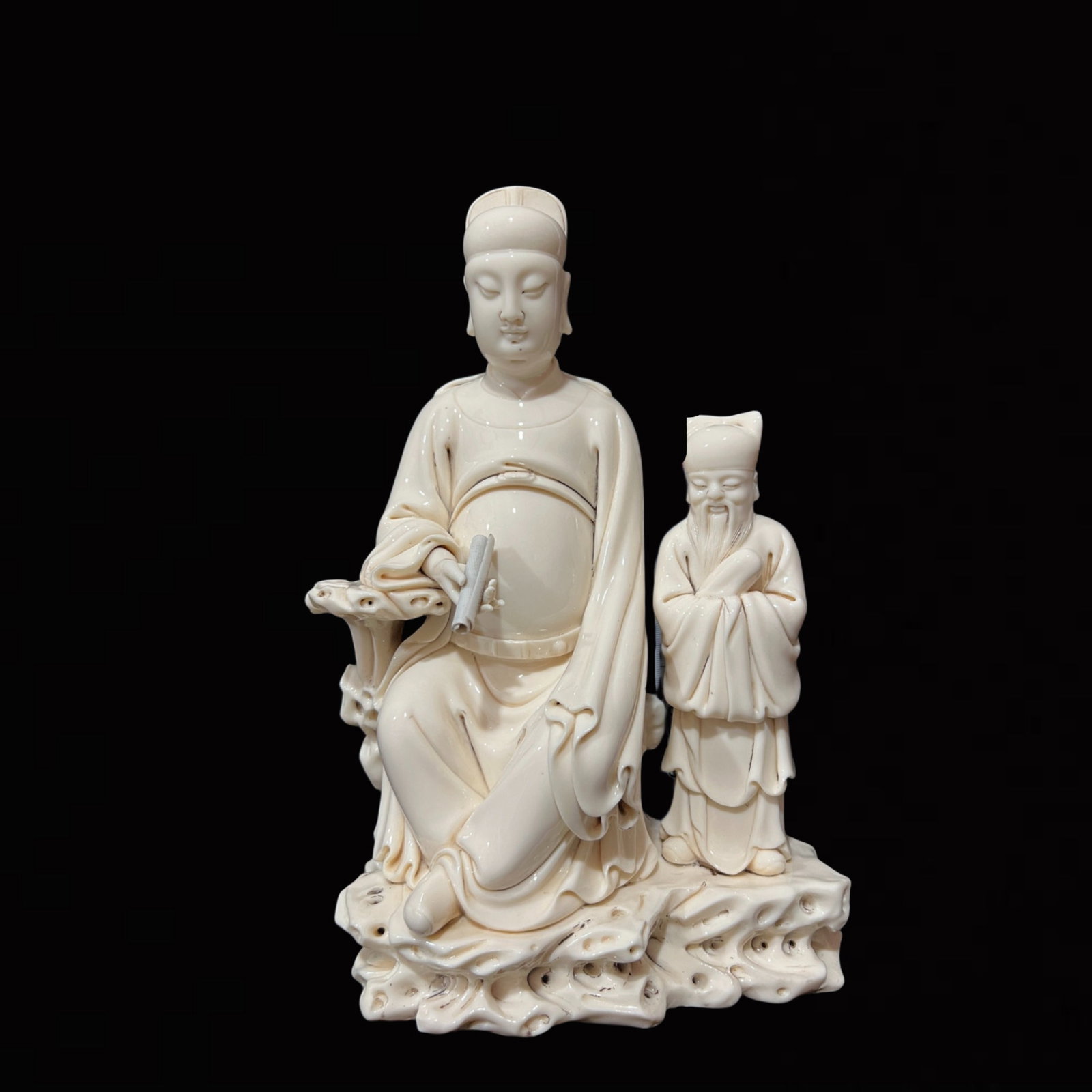 A Solemn Blance-De-Chine Statue of Figure