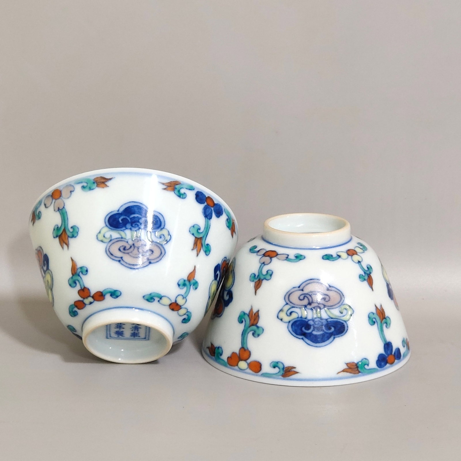 A Pair of Exquisite Doucai Ganoderma lucidum Pattern Cups: A Pair of Exquisite Doucai Ganoderma lucidum Pattern Cups,Qing Dynasty,China,Yongzheng Six-character Mark,Size:1.7inx2.9in