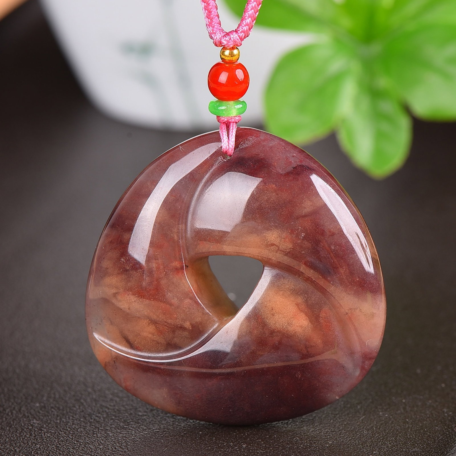 An Exquisite Red Jade Pendant