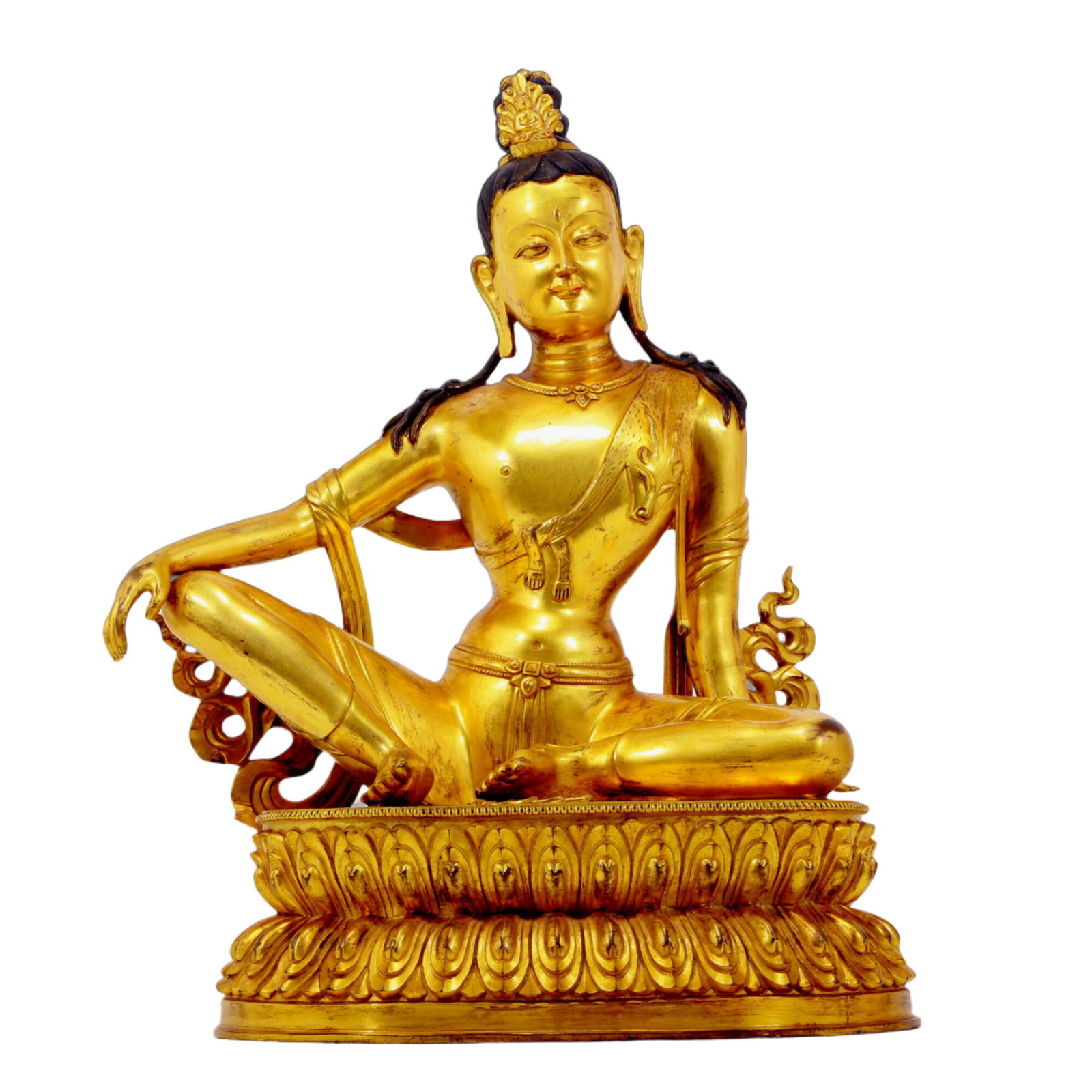 A solemn gilt bronze statue of Guanyin