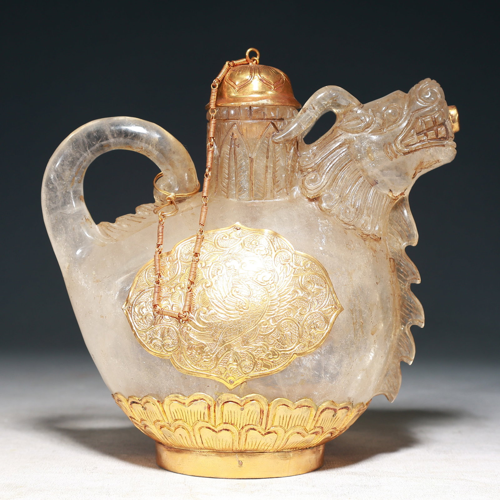 An Exquisite Crystal Cover with Gold Dragon and Phoenix Pattern Beast-head Pot: An Exquisite Crystal Cover with Gold Dragon and Phoenix Pattern Beast-head Pot,Tang Dynasty, China,Zhenguan Four-character Mark,Size:7.9inx3.9inx8.5in,Weight:2200g 水晶包金(