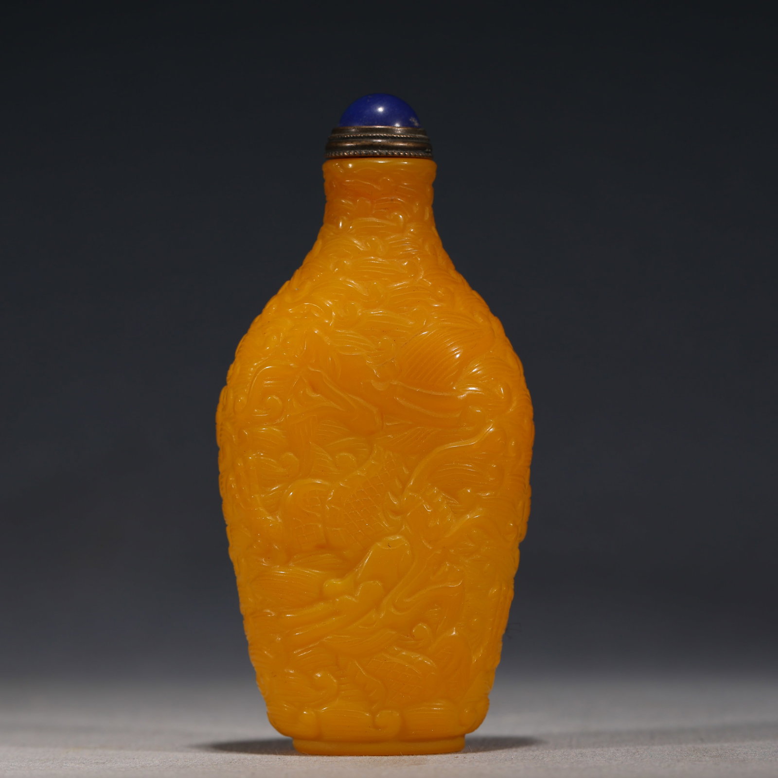 An Exquisite Chicken-fat Yellow Glass Sea Wave Cloud Dragon Pattern Snuff Bottle: An Exquisite Chicken-fat Yellow Glass Sea Wave Cloud Dragon Pattern Snuff Bottle,Qing Dynasty, China,Yongzheng Four-character Mark,Size:1.8in×1in×3.7in 鸡油黄琉஦