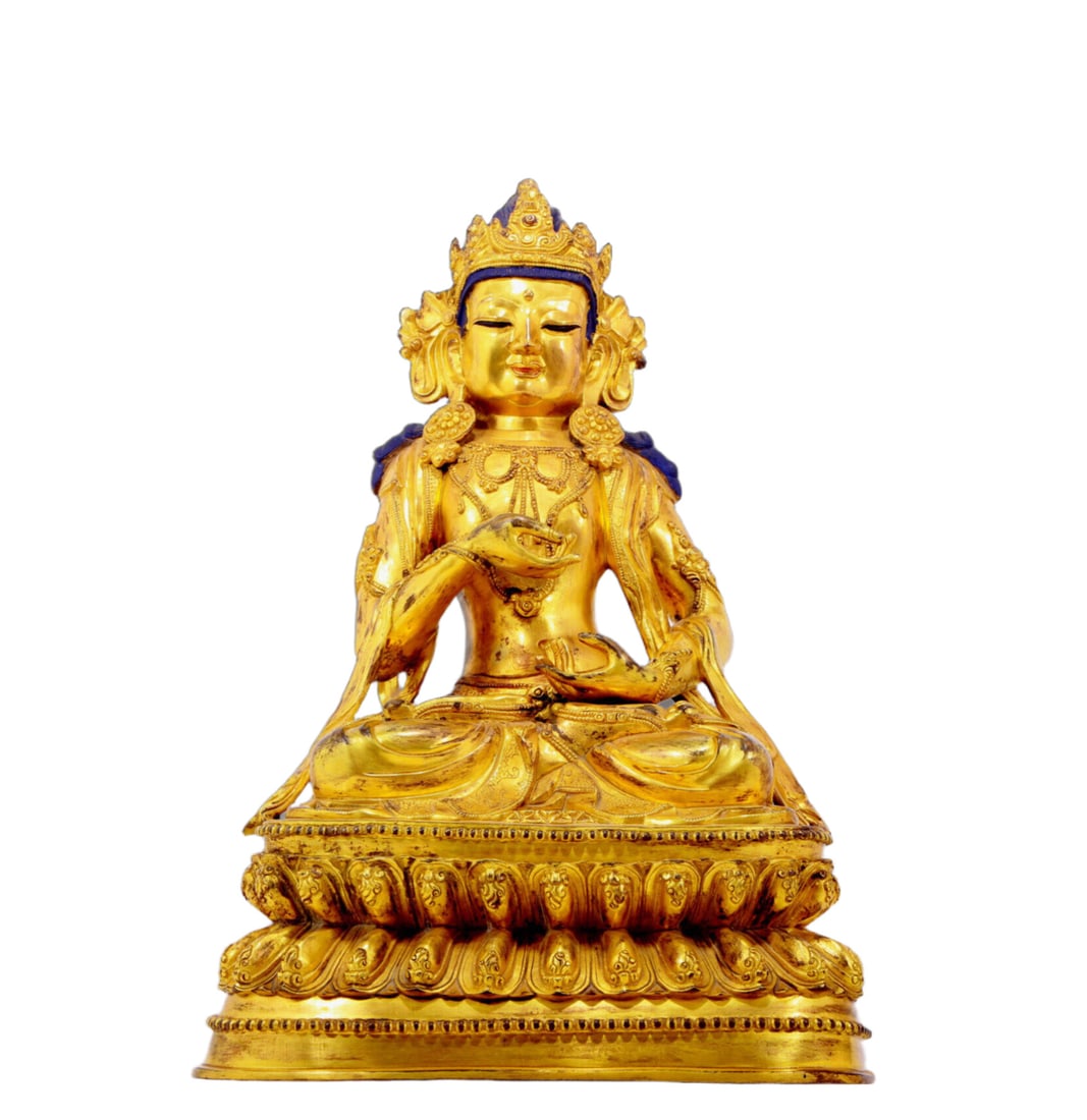 A solemn gilt bronze statue of Bodhisattva