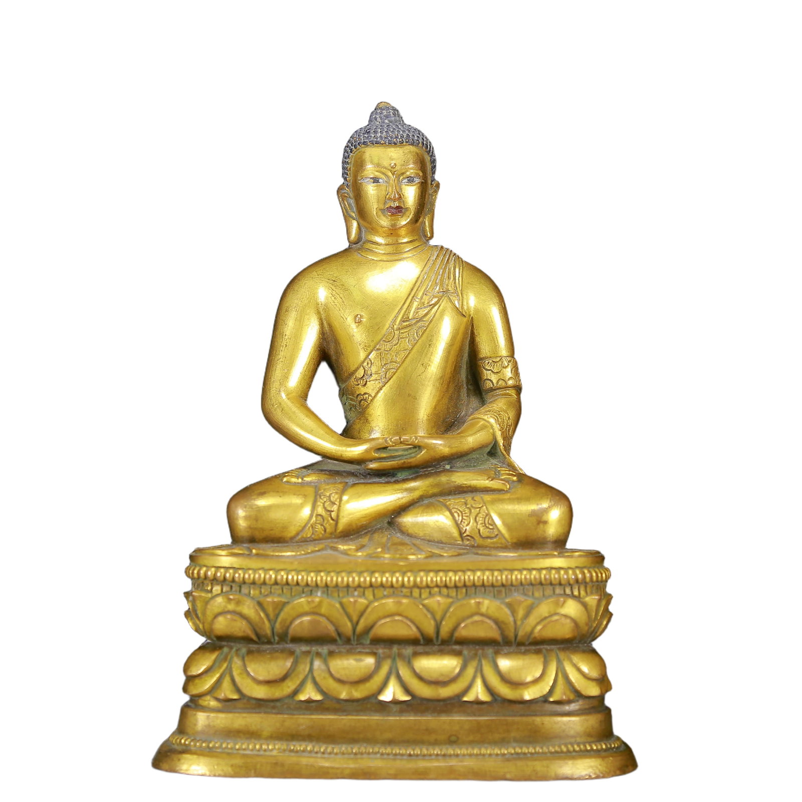 A Solemn Gilt Bronze Statue of Sakyamuni: A Solemn Gilt Bronze Statue of Sakyamuni,Qing Dynasty, China,Size:4.7inx3.3inx7.1in,Weight:1540g 铜鎏金释迦摩尼像，清代