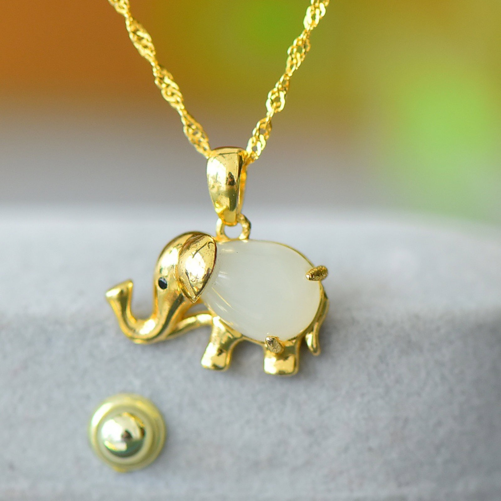 An Exquisite Bronze-Gold Plated Inlaid White Jade Elephant Necklace