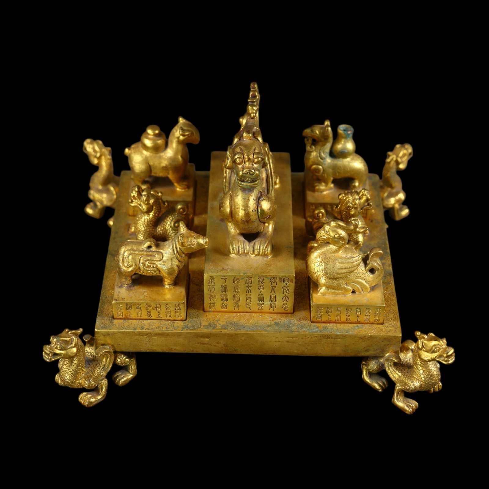A Set of Fine Gilt Bronze Beast Seals: A Set of Fine Gilt Bronze Beast Seals,Qing Dynasty,China,Size:(Base)3.1inx8.7inx8.1in,(Seal)3.9inx4.7inx2in,2.4inx1.6in,Weight:4760g