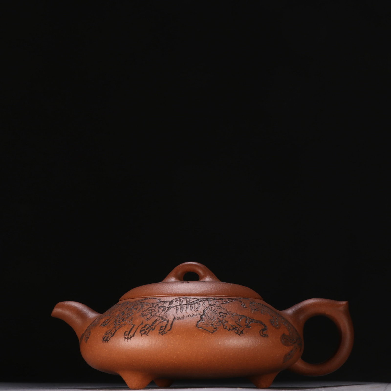 A Rare Purple Sands Tiger Pattern Tripod Teapot: A Rare Purple Sands Tiger Pattern Tripod Teapot,Qing Dynasty,China,YHuang Yulin Mark,Size:3inx7.4in