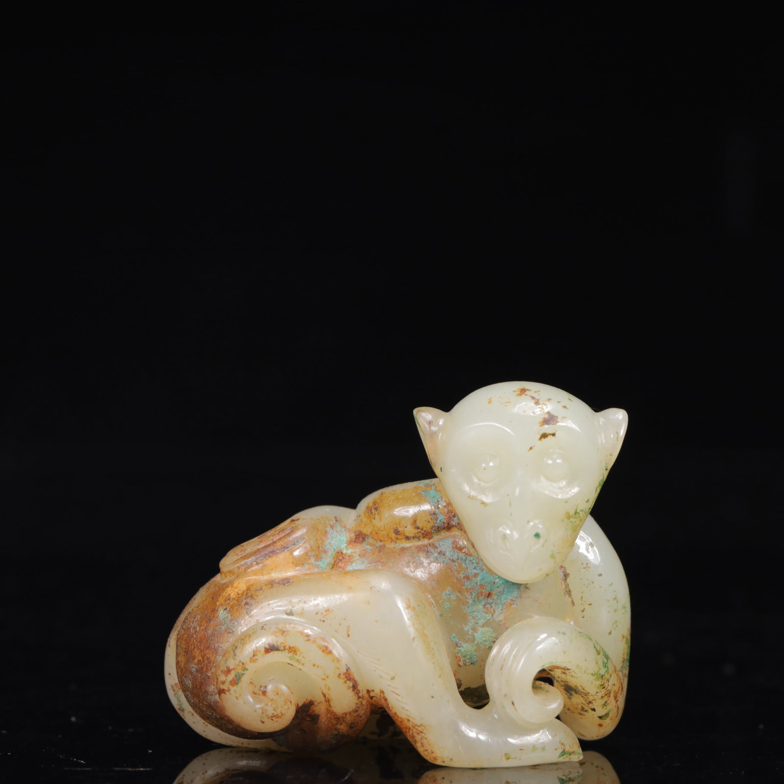 An Exquisite White Jade Monkey Ornament