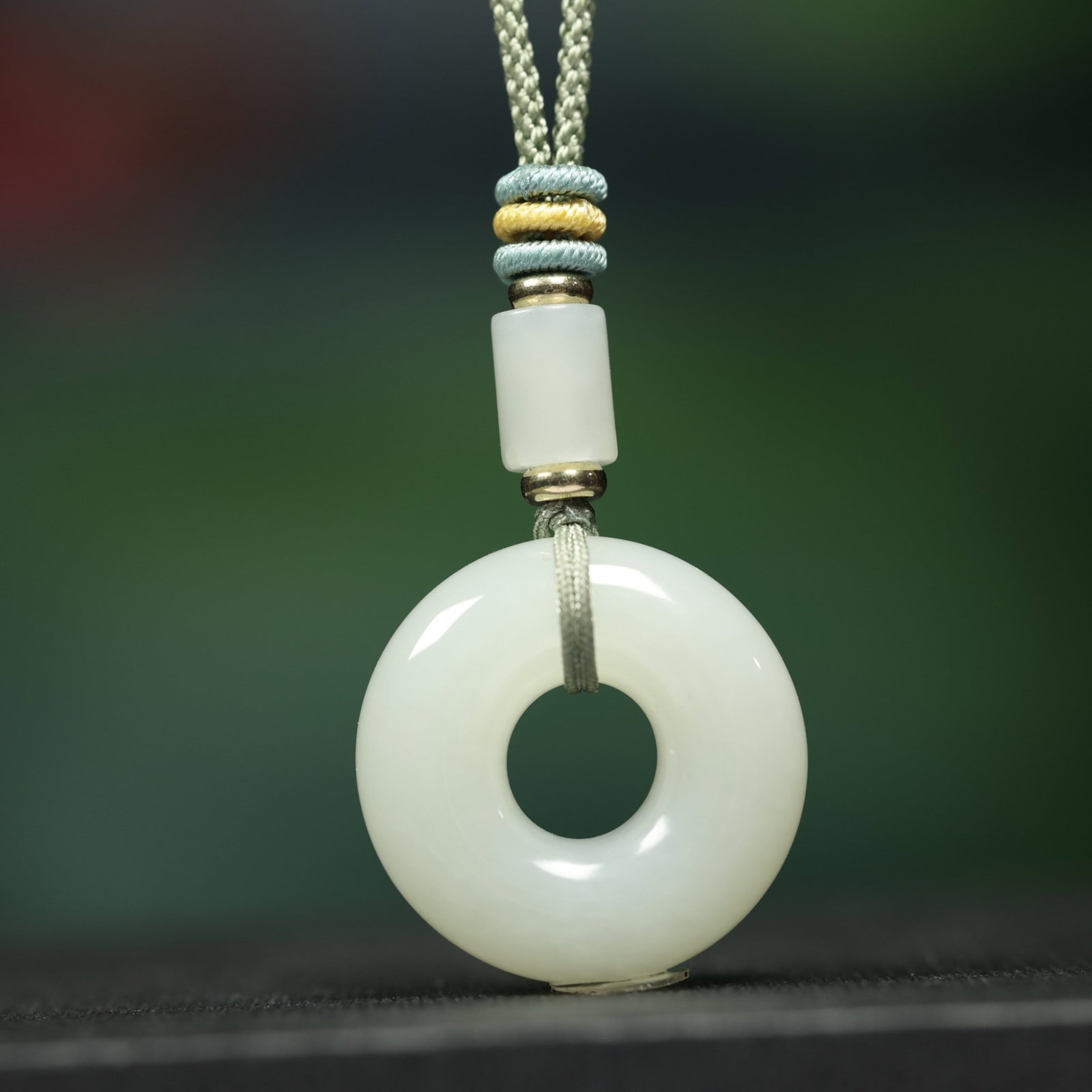 An Exquisite White Jade Pendant
