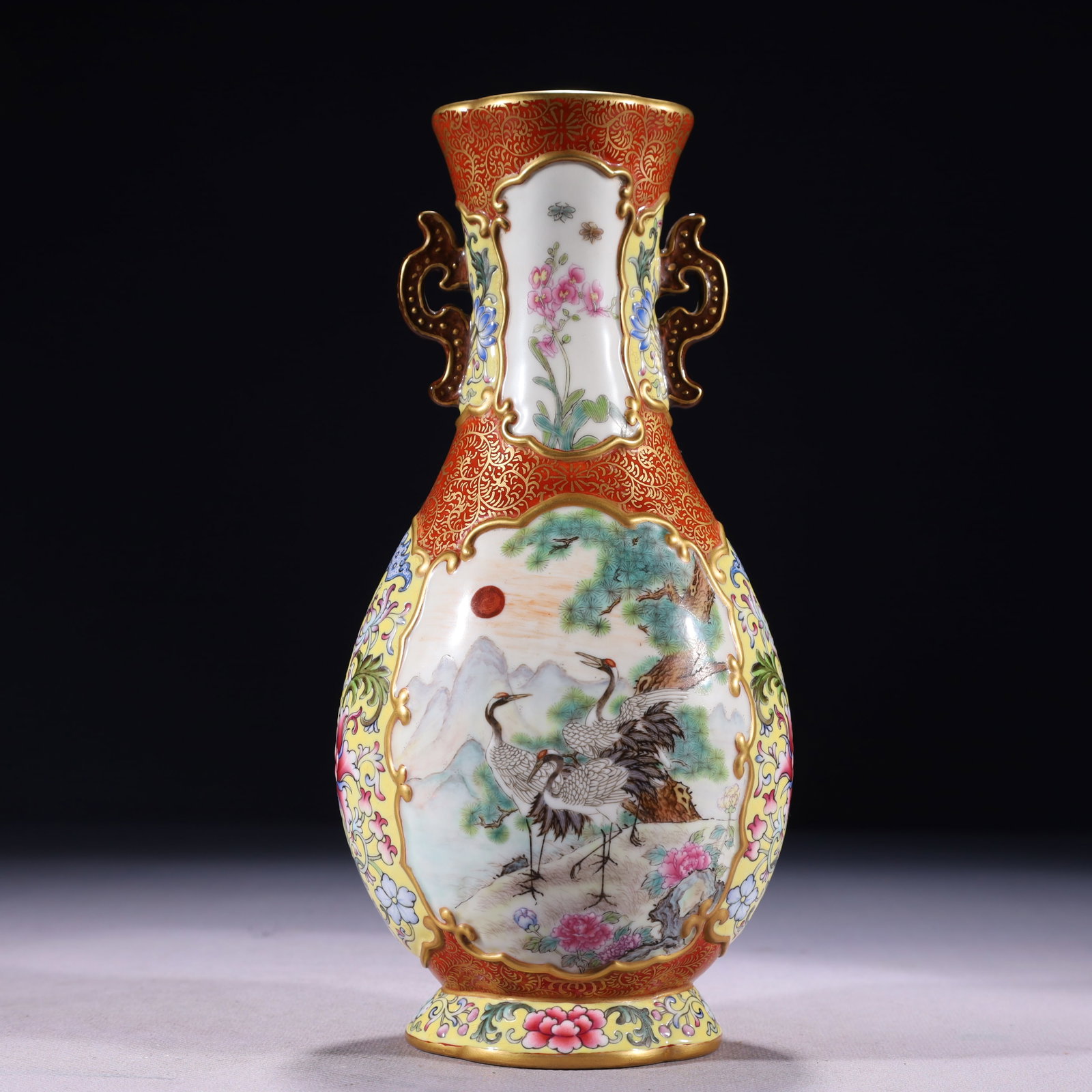 An Exquisite Yellow Ground Enamel Painted Gold Lotus Pattern Double-Ears Vase: An Exquisite Yellow Ground Enamel Painted Gold Lotus Pattern Double-Ears Vase,Qing Dynasty,China,Qianlong Six-character Mark,Size:4.3inx3.1inx9.1in,Weight:700g 黄地珐琅彩