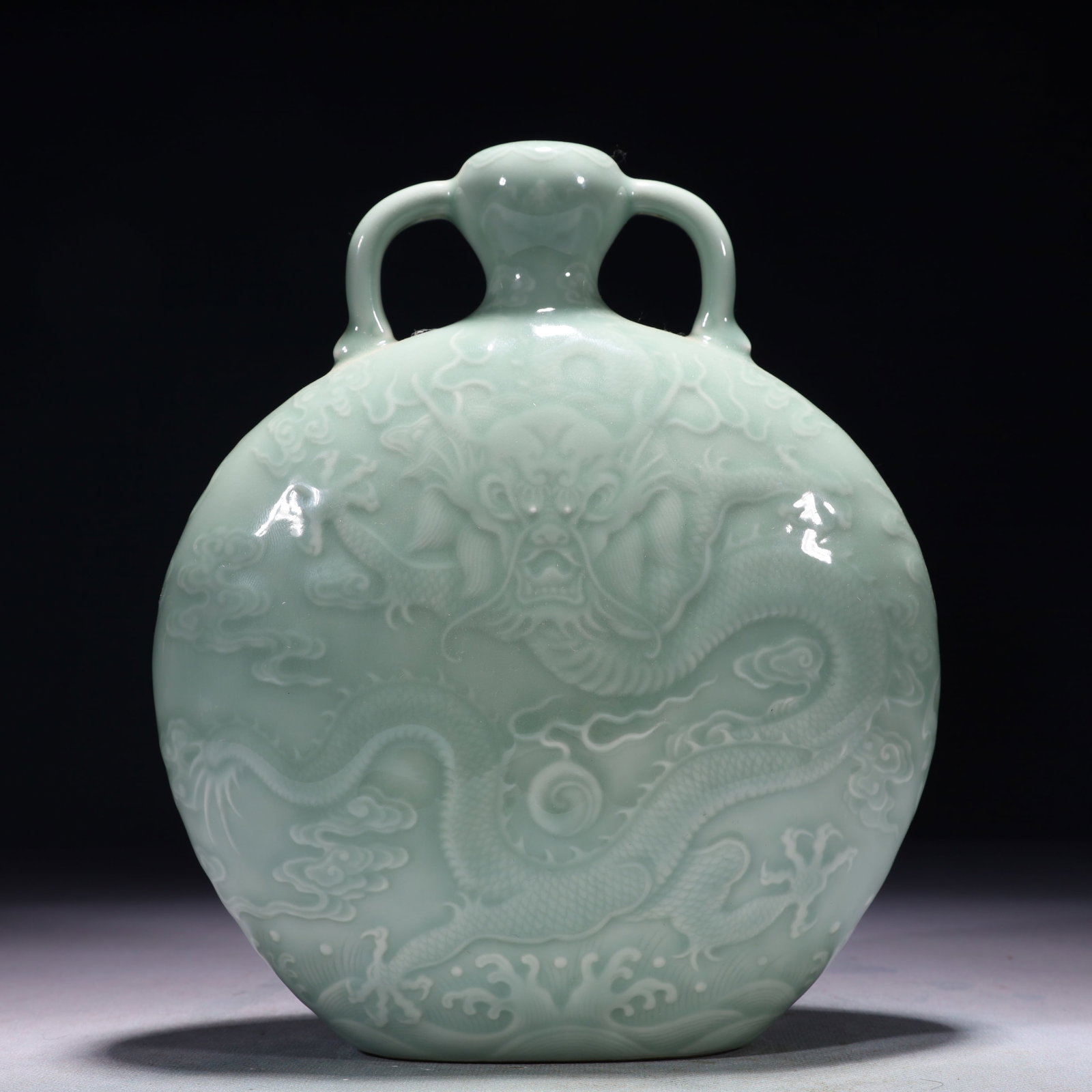 An Exquisite Celadon Glazed Auspicious Cloud and Dragon Pattern Double-Ears Vase