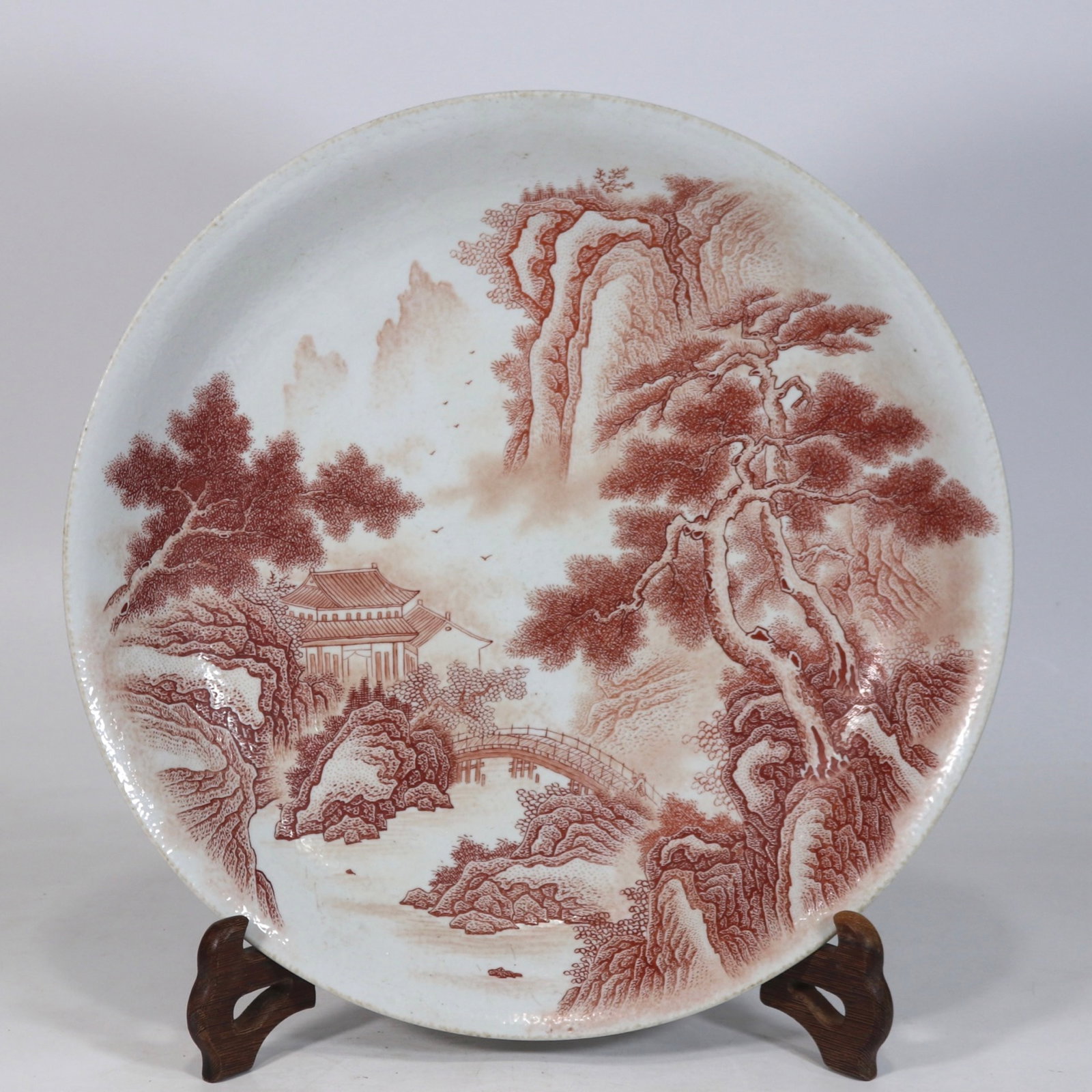 A fine iron-red large dish with landscape pattern: A fine iron-red large dish with landscape pattern, Qing Dynasty, China, with six-character Kangxi reign mark, Size:3inx16.5inA fine iron-red large dish with landscape pattern, Qing Dynasty, China,