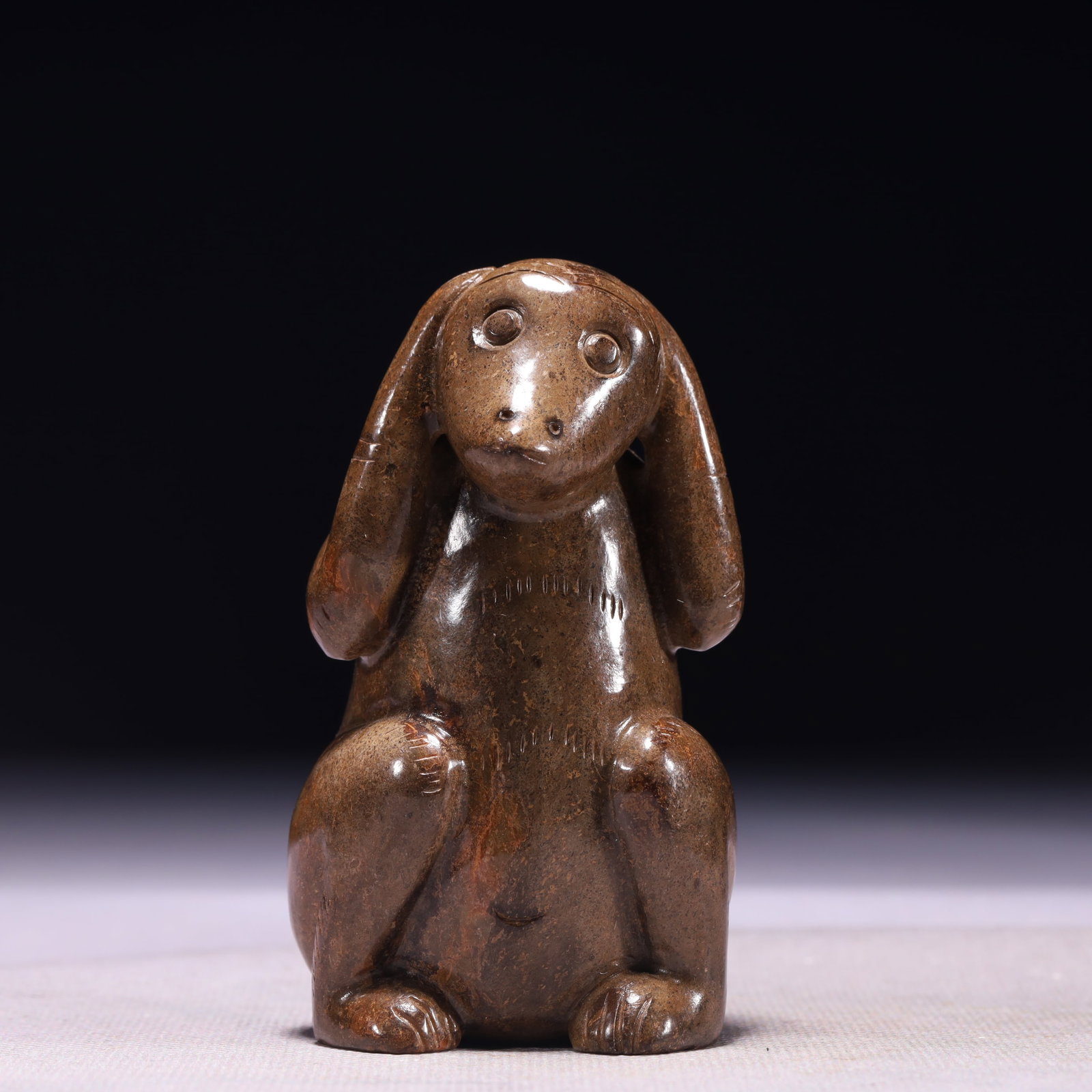 An Exquisite Archaic Jade Monkey Ornament: An Exquisite Archaic Jade Monkey Ornament,Ancient Time,China,Size:2inx1.6inx3.5in,Weight:325g 高古玉猴子摆件,中国远古时期