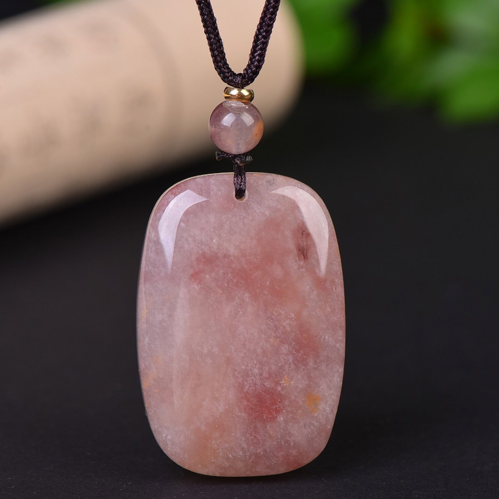 An Exquisite Red Jade Pendant