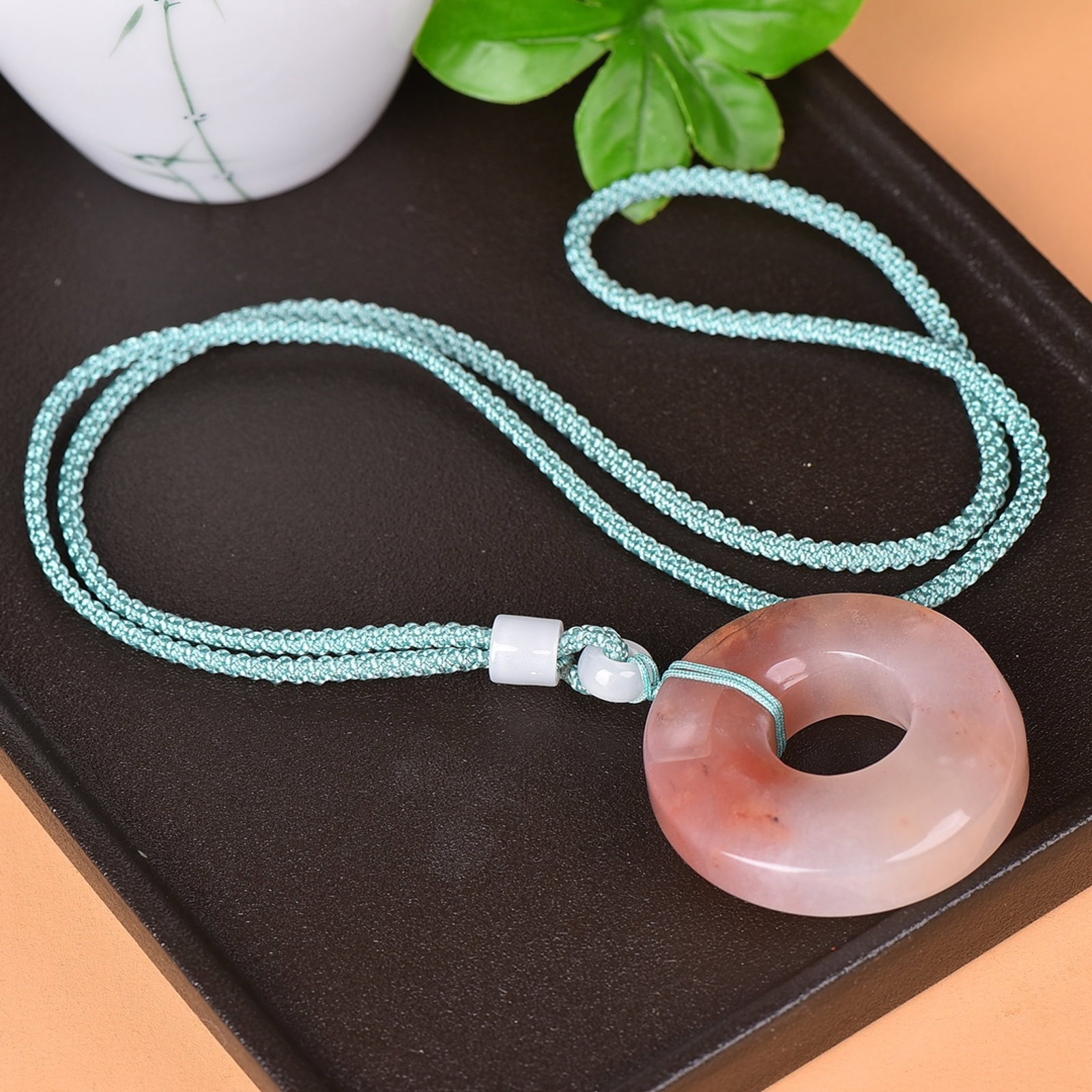 An Exquisite White Jade Pendant