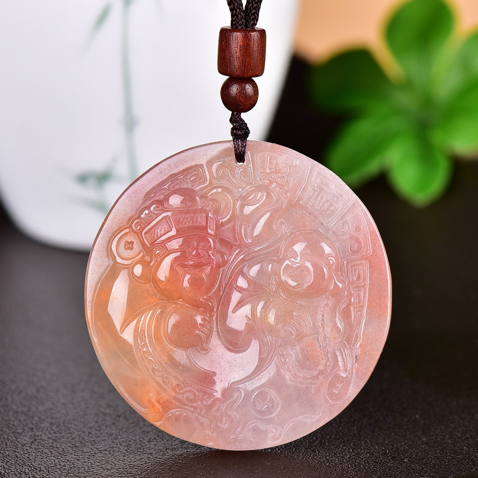An Exquisite Red Jade Figure Pattern Pendant