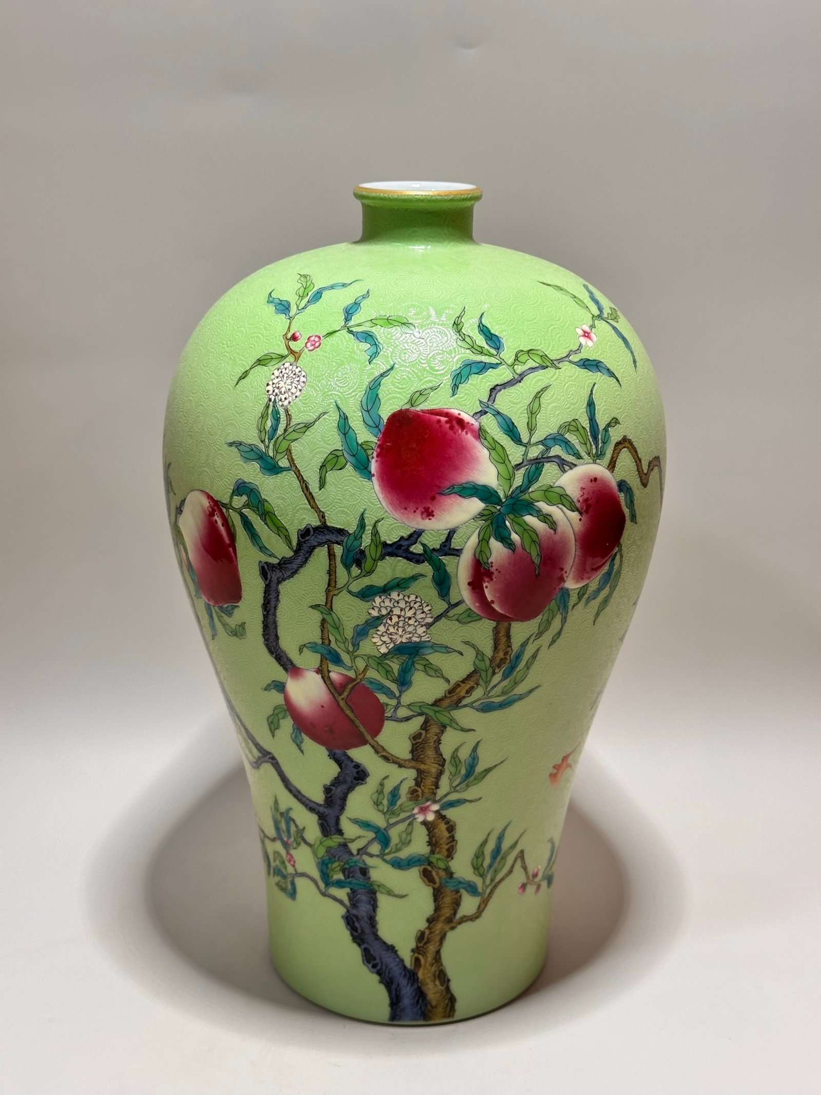 A Rare Green Ground Famille-Rose Bats and Peach Pattern Vase: A Rare Green Ground Famille-Rose Bats and Peach Pattern Vase,Qing Dynasty,China,Yongzheng Six-character Mark,Size:13.1inx8.3in 绿地粉彩福寿纹瓶,中