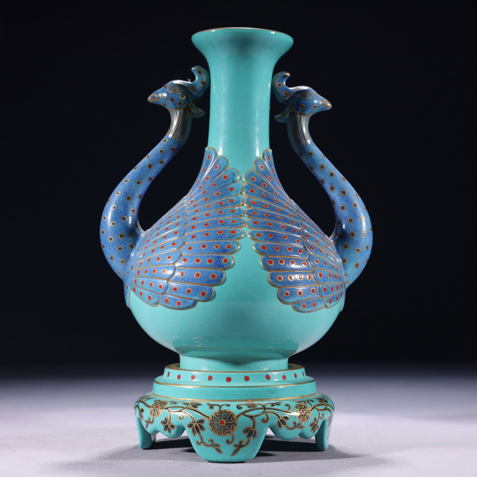 An Exquisite Turquoise Glazed Painted Gold Peacock-Ears Vase: An Exquisite Turquoise Glazed Painted Gold Peacock-Ears Vase,Qing Dynasty,China,Qianlong Six-character Mark,Size:6.3inx9.8in,Weight:950g 松石绿釉描金孔雀