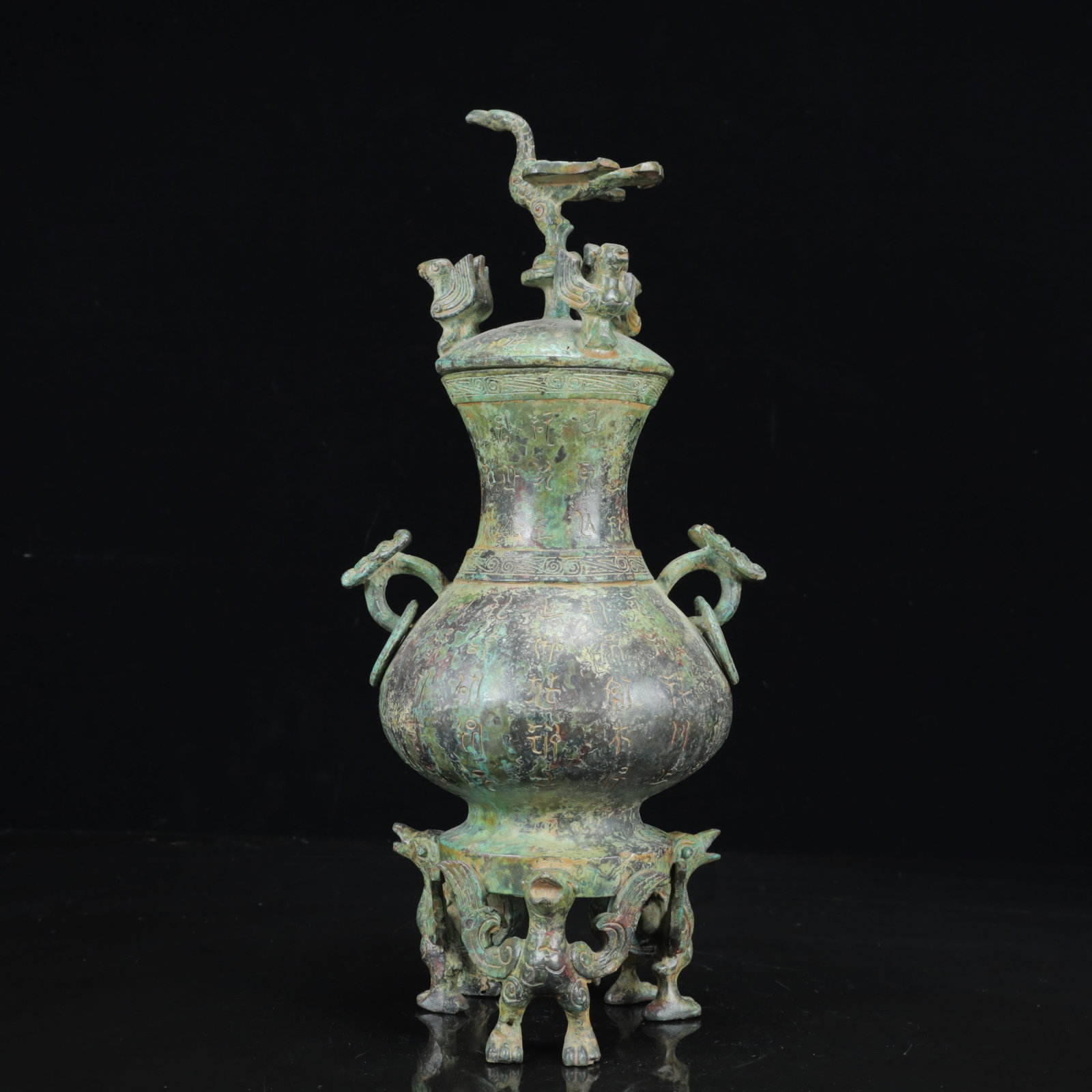 An Archaic Bronze Inscription Double-Ears and Phoenix Legs Vase: An Archaic Bronze Inscription Double-Ears and Phoenix Legs Vase,the Warring States Period in China,Size:6.7inx5.1inx14.2in,Weight:2750g