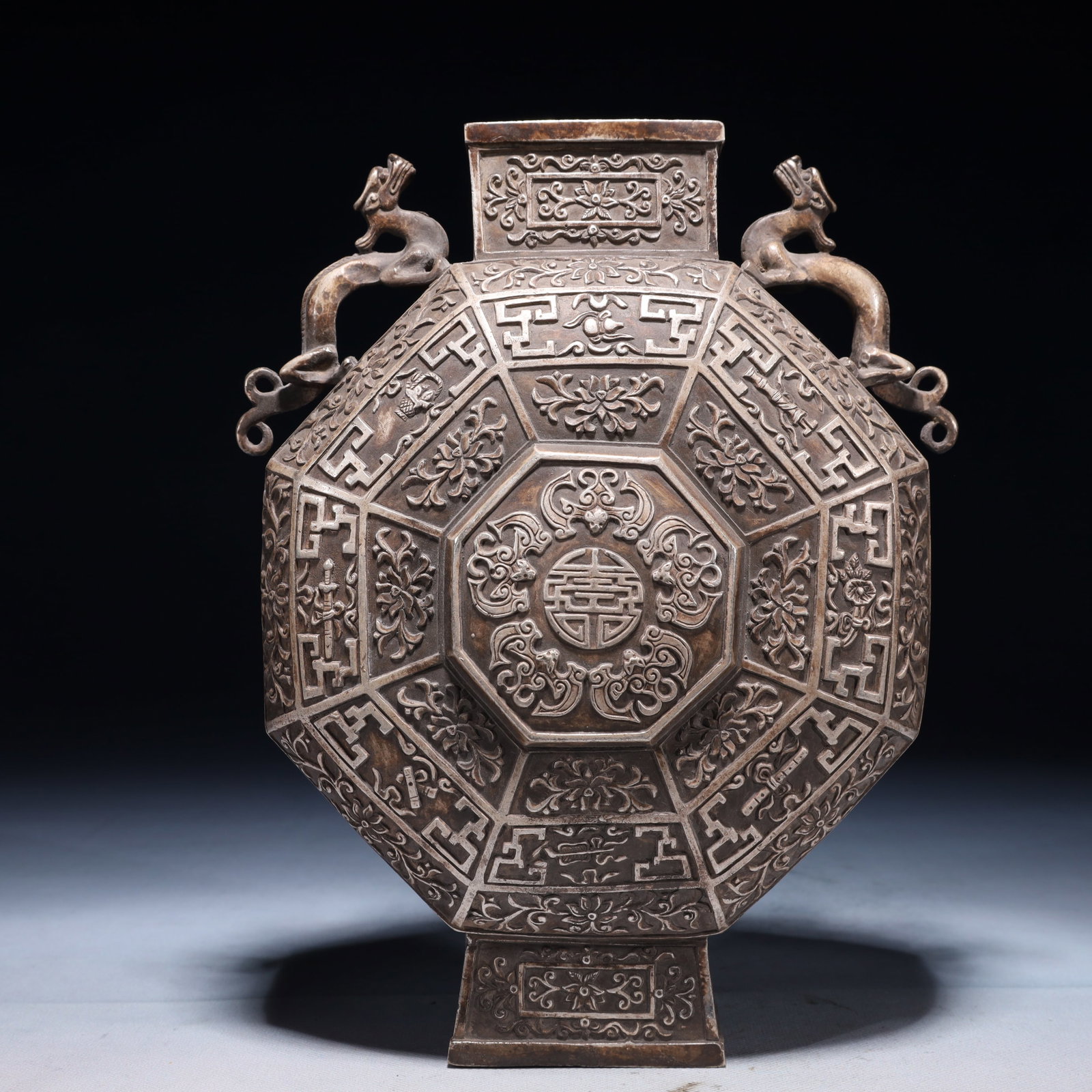 An Exquisite Silver-plated Bronze Bats and Peach Pattern Double-Ears Vase: An Exquisite Silver-plated Bronze Bats and Peach Pattern Double-Ears Vase,Qing Dynasty,China,Qianlong Four-character Mark,Size:7.1inx3.9inx10.2in,Weight:1800g