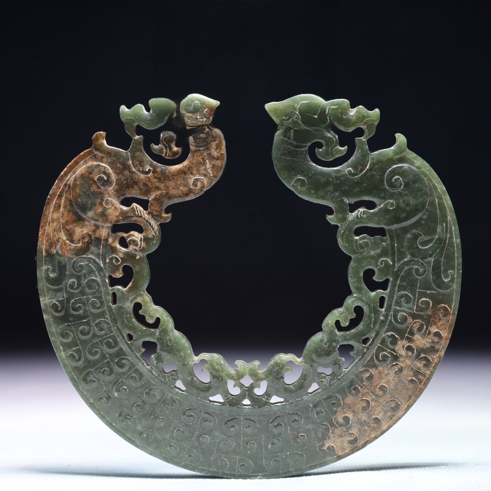 An Exquisite Jasper Dragon Pattern Ornament: An Exquisite Jasper Dragon Pattern Ornament,Qing Dynasty,China,Size:4.7inx4.1in,Weight:101.1g 碧玉龙纹摆件,中国清代