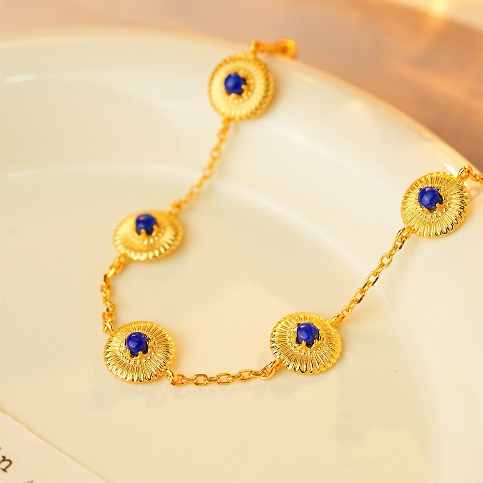 An Exquisite Sterling Silver-Gold Plated Inlaid Lapis Lazuli Bracelets: An Exquisite Sterling Silver-Gold Plated Inlaid Lapis Lazuli Bracelets,Size:4mm,Weight:8.67g 纯银镀金镶青金石手链